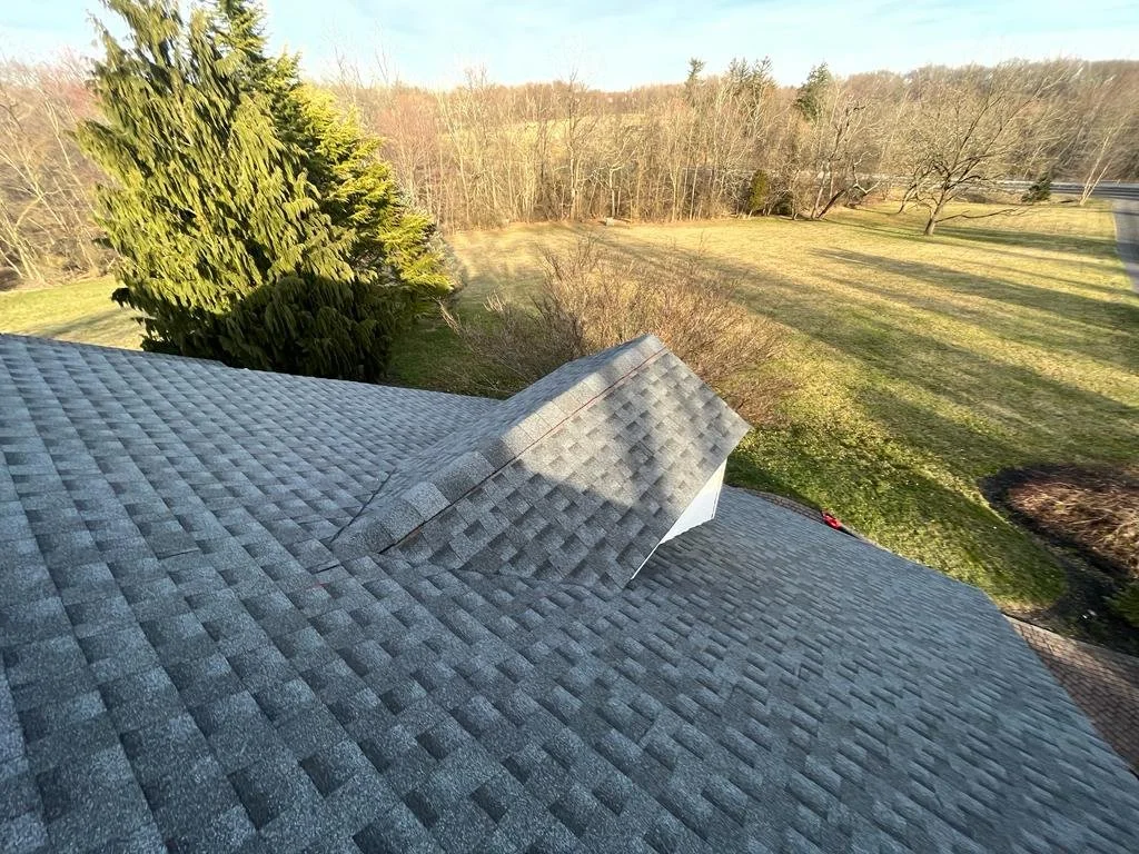 Completed gray shingle roofing from the RoofEx project gallery