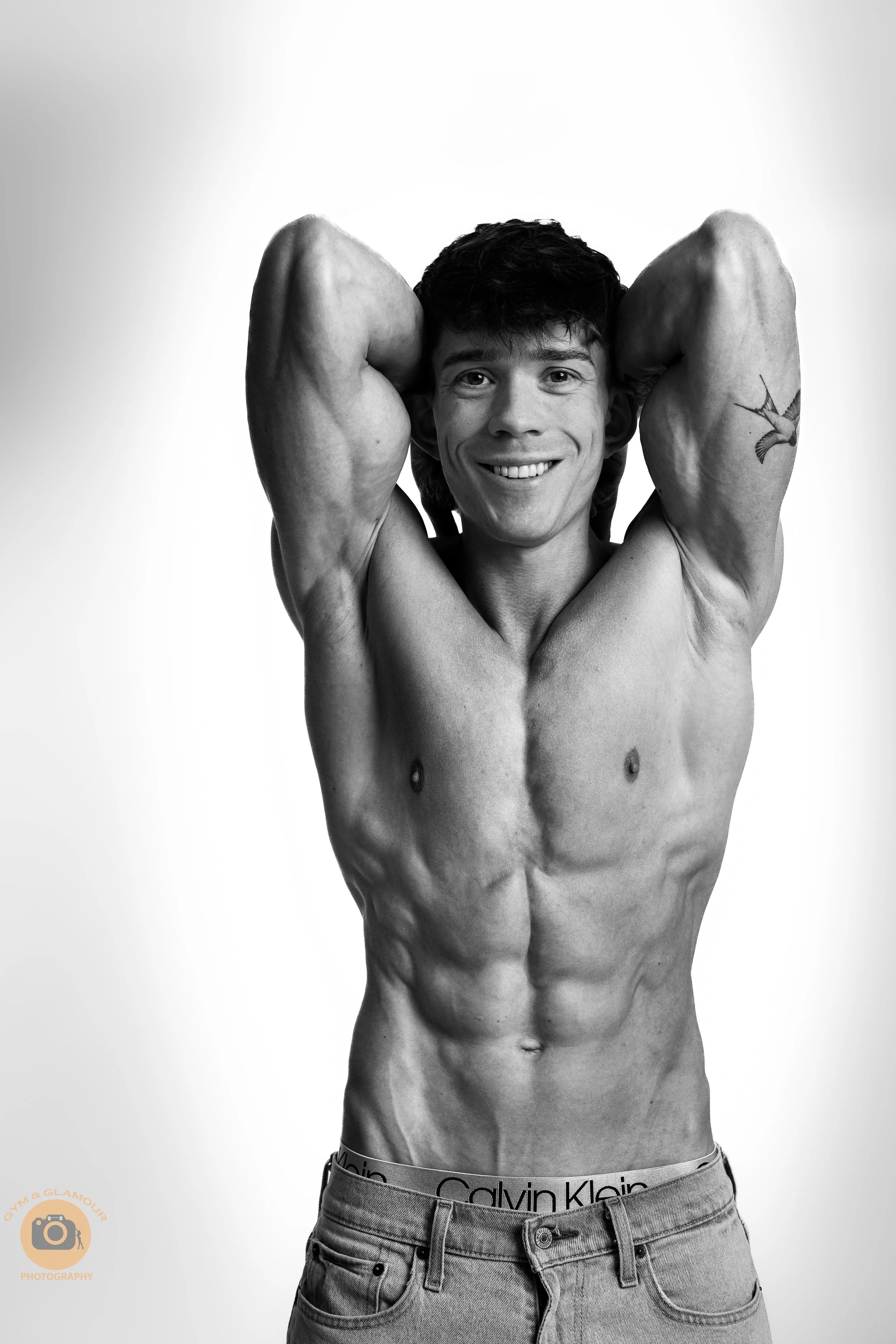 Bodybuilding athlete posing for a professional physique photoshoot in Sydney