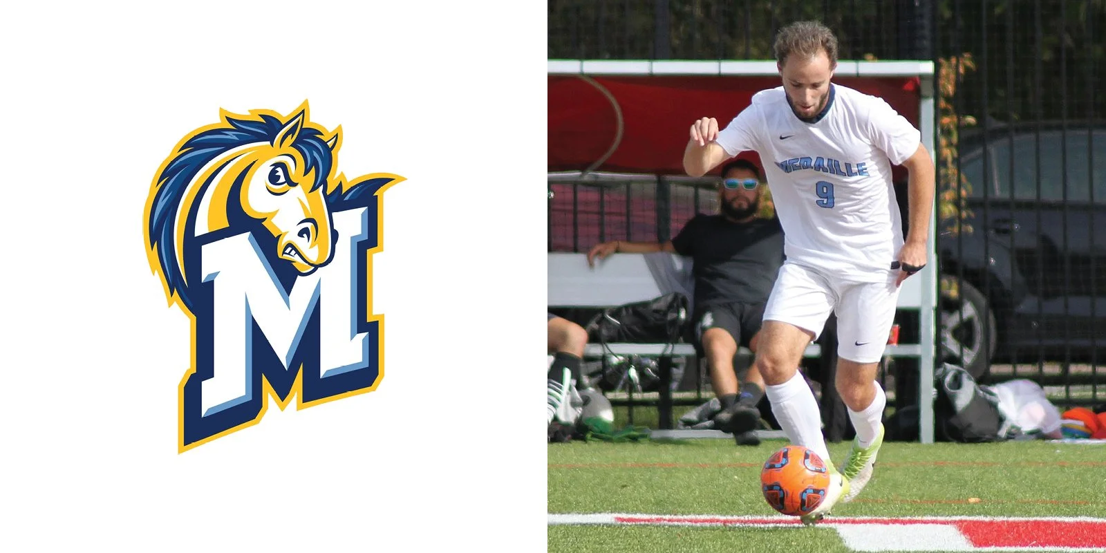 Soccer player in white uniform dribbling a soccer ball on field next to a mustang logo with the letter 'M'.