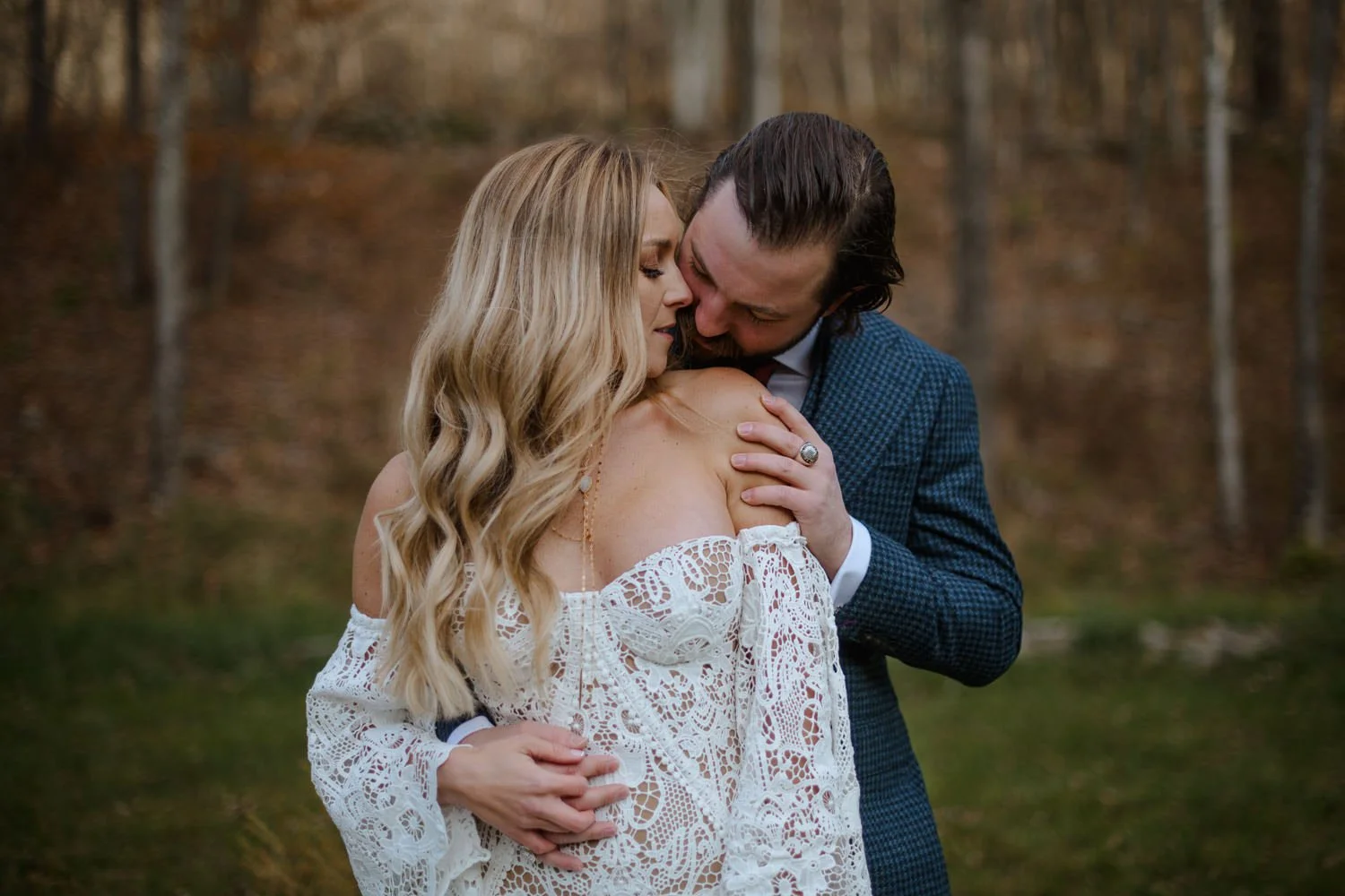 bride and groom share intimate moment alone during their wedding portraits.