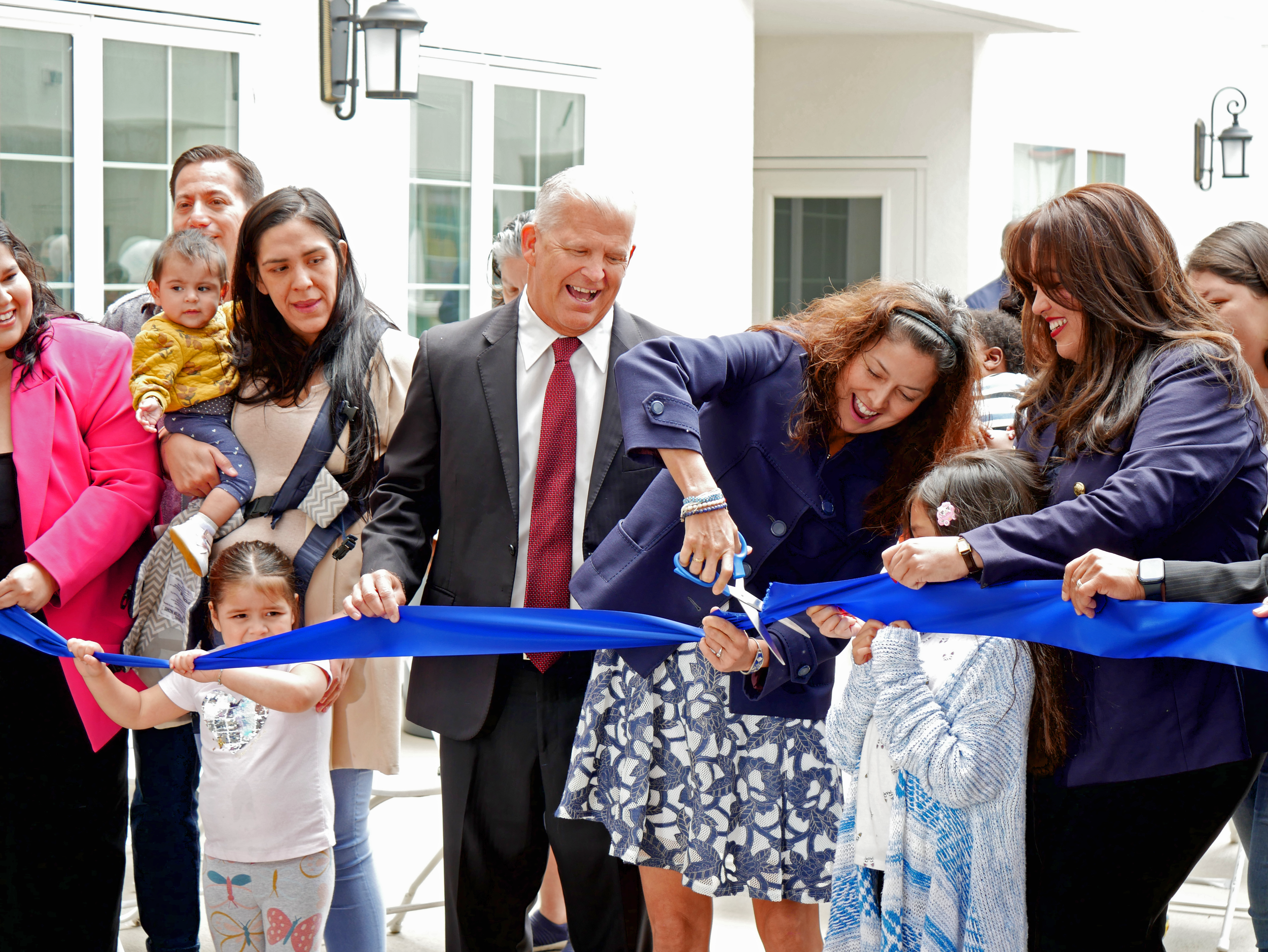 Ribbon cutting.png