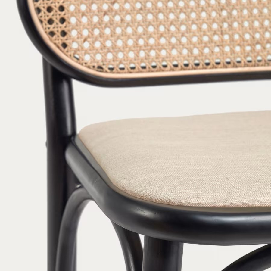Doriane is a hand-crafted stool made from sustainably-sourced solid elm, hand-woven rattan and a seat with linen-effect water-repellent upholstery. Put it next to your kitchen island or breakfast bar to create a trendy, natural look thanks to this up