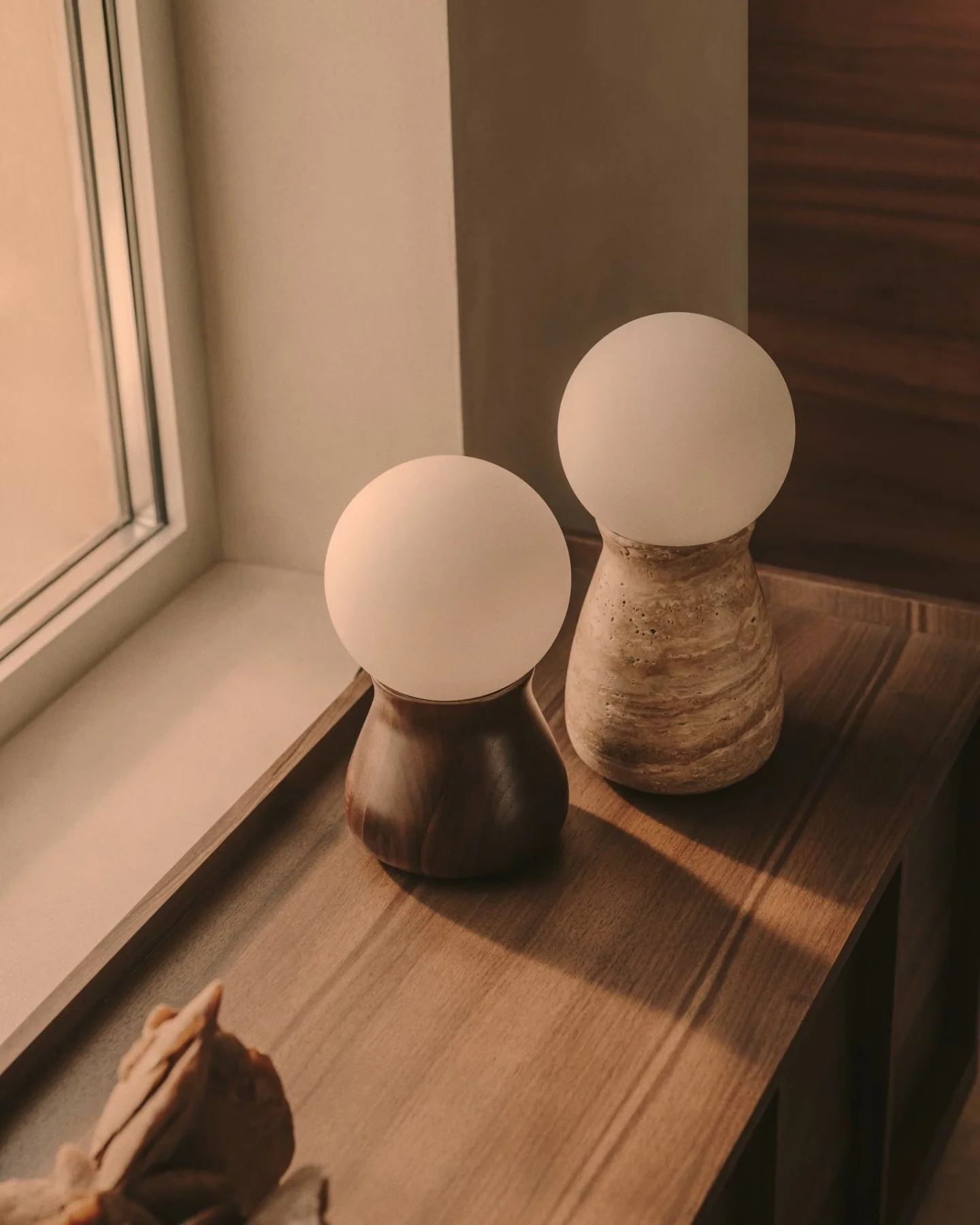 The sweetest little lamps, coming to our showroom for you real soon 🤎
Travertine &amp; walnut perfection. 

@kavehome_au