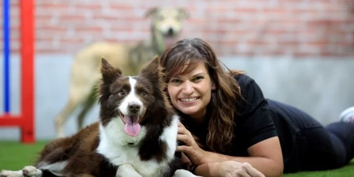 Aimee Ormee working with a dog at Fetch Dubai