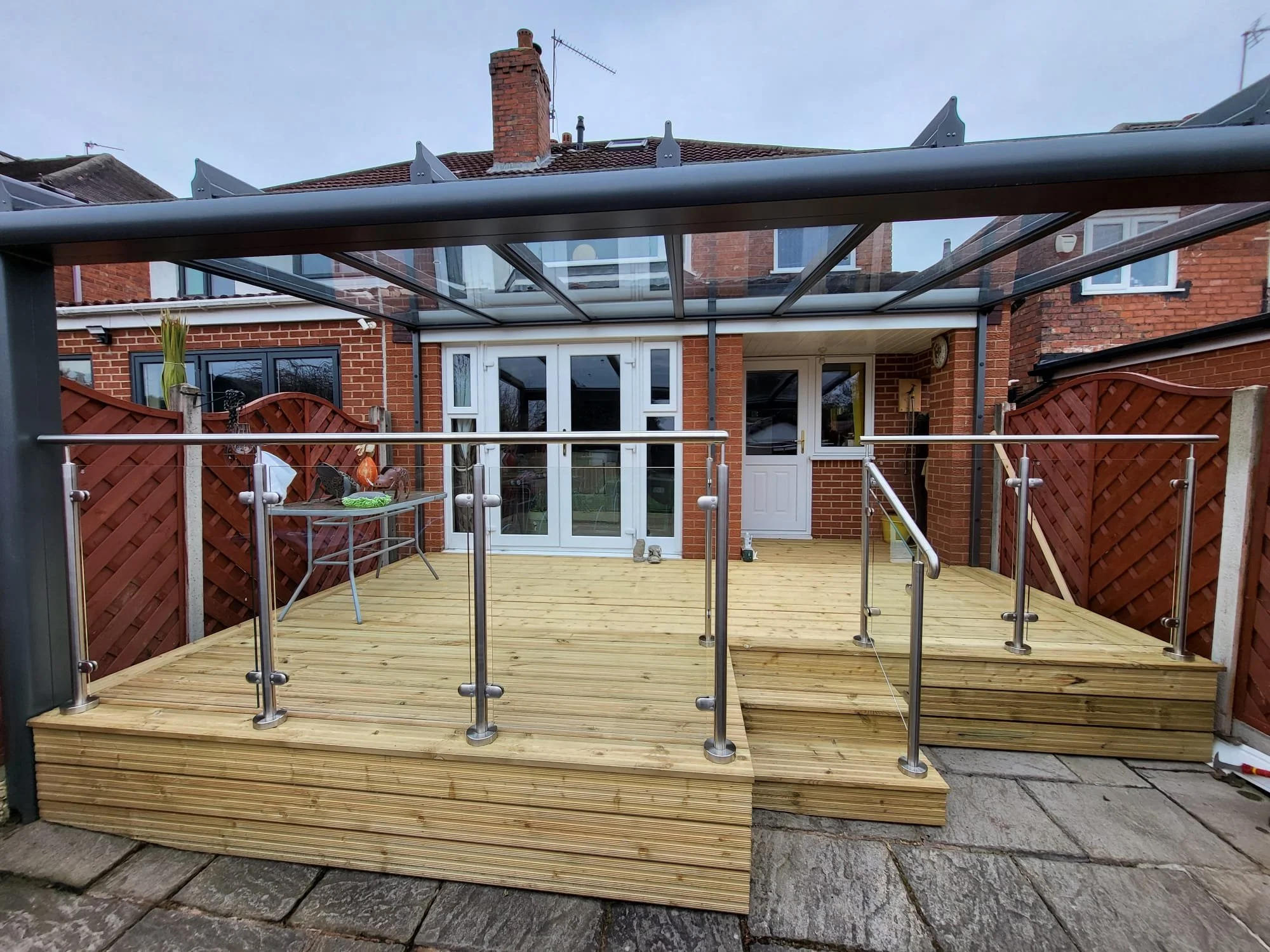 Timber decking with steps and balustrade