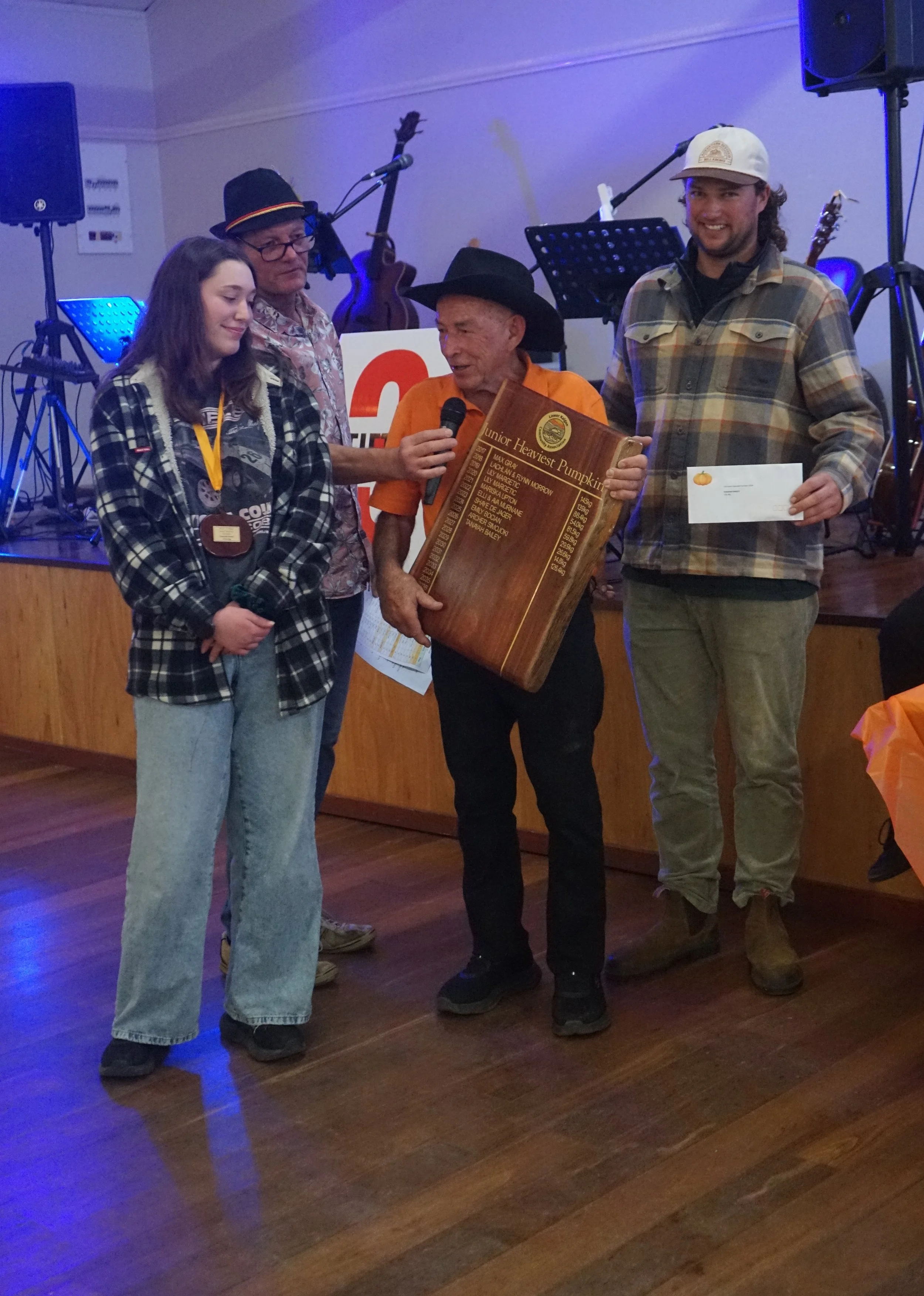 &nbsp; Junior Winner Tanayah Bailey receives her trophy