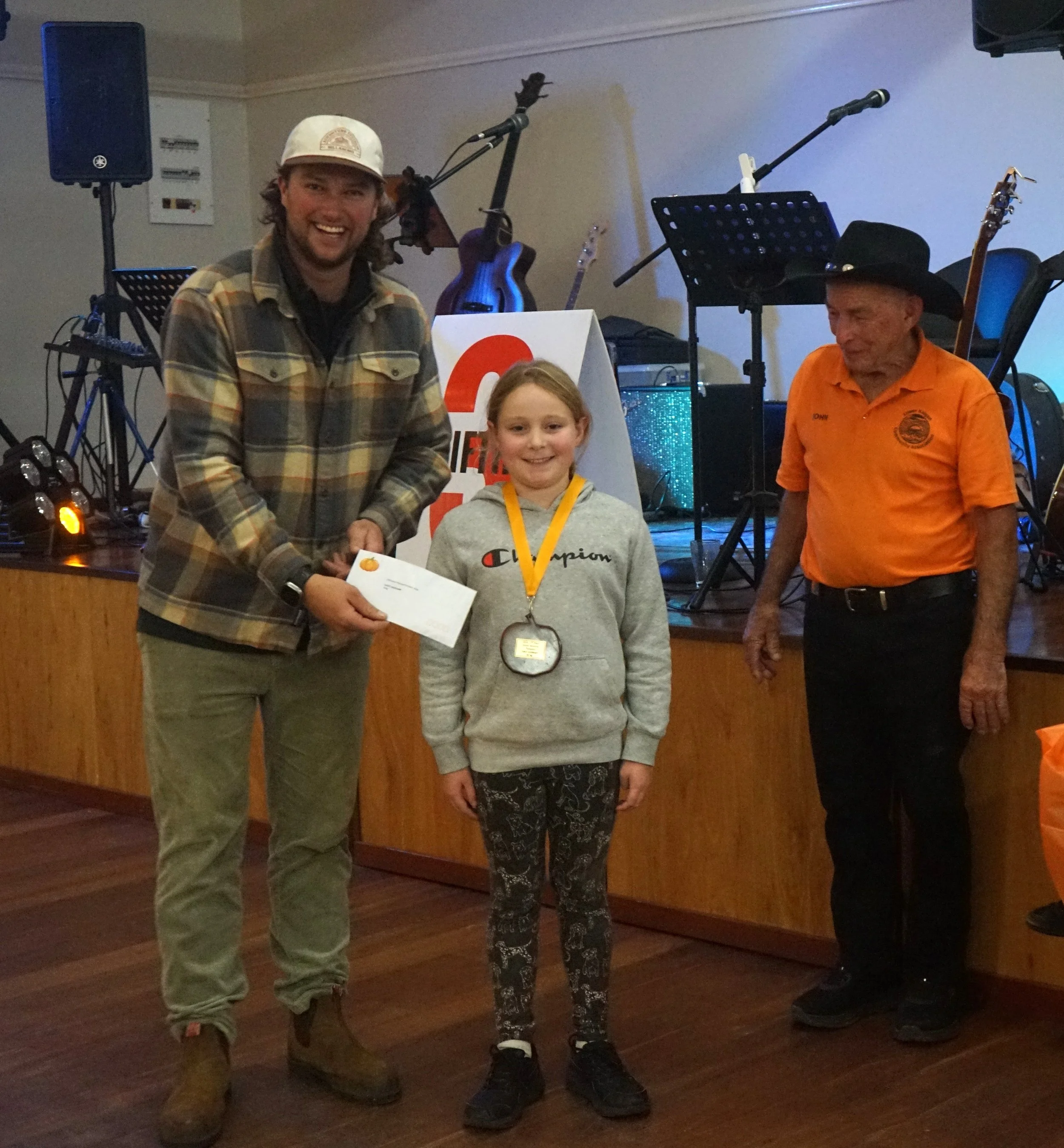 2nd Placed Junior Winner Lucy Lockhart receives her Medallion