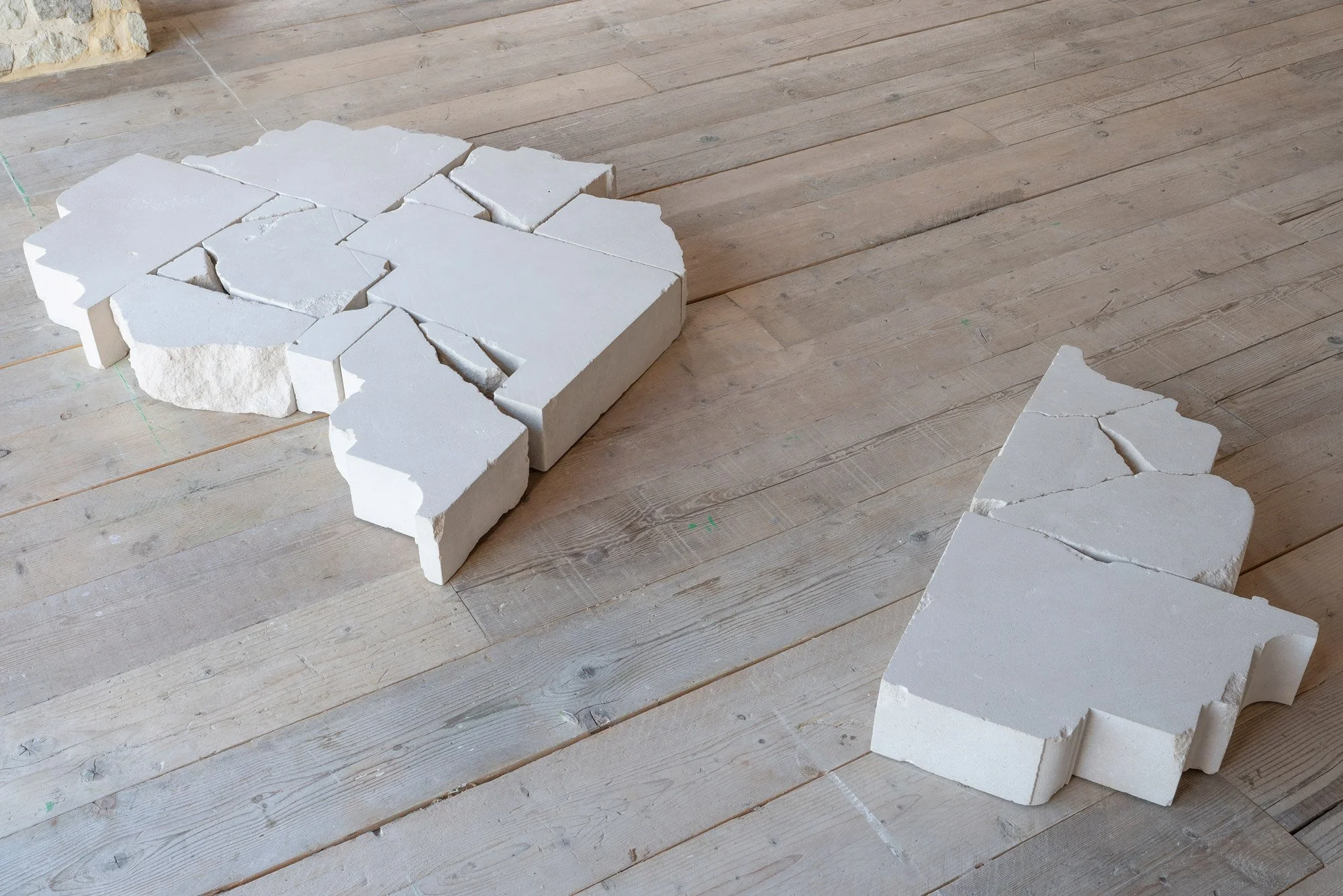 New Order, 2025, Portland stone, size variable, here: 12.5 x 104 x 215 cm