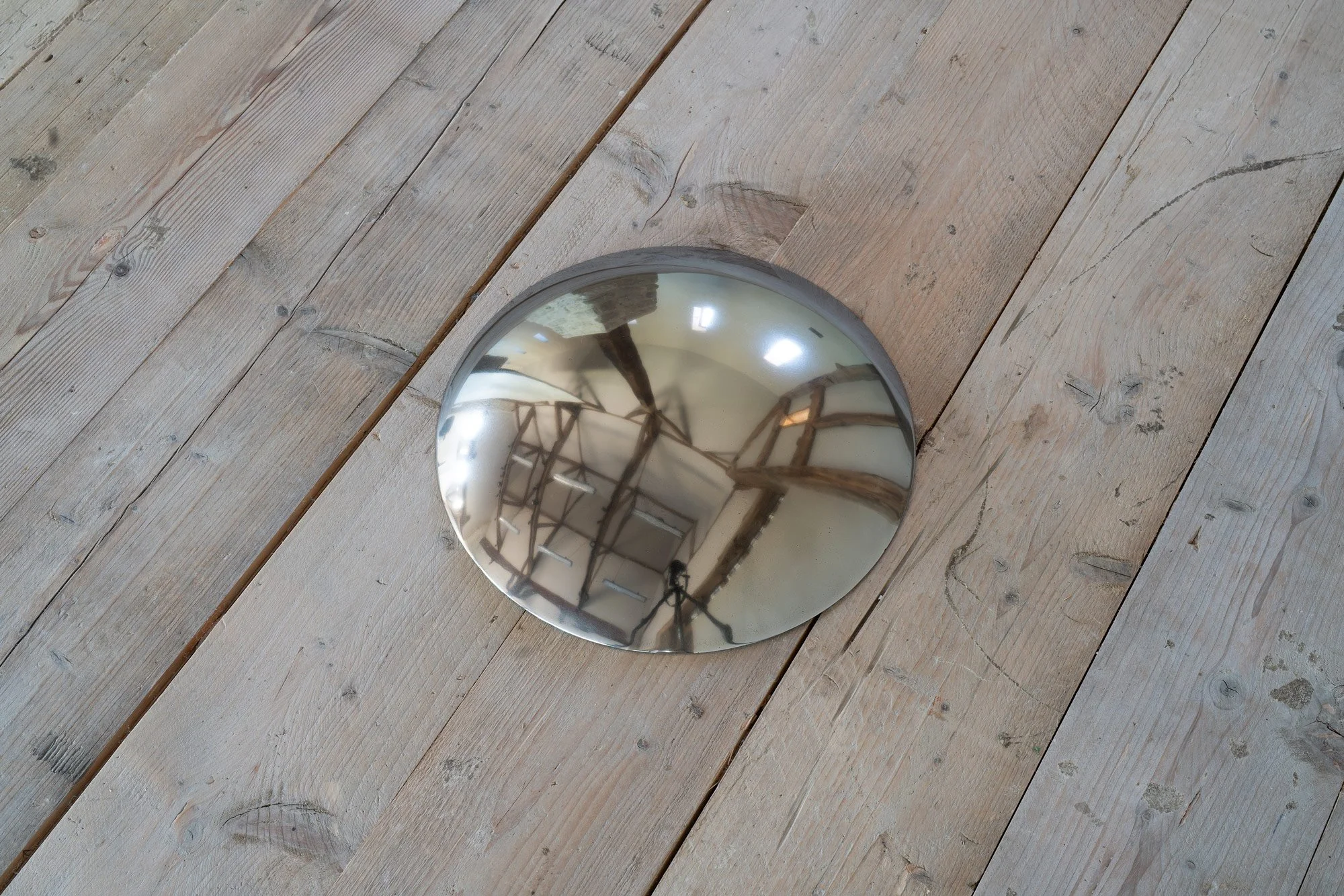 From Earth, 2025, bell metal, 8 x 41 x 41 cm