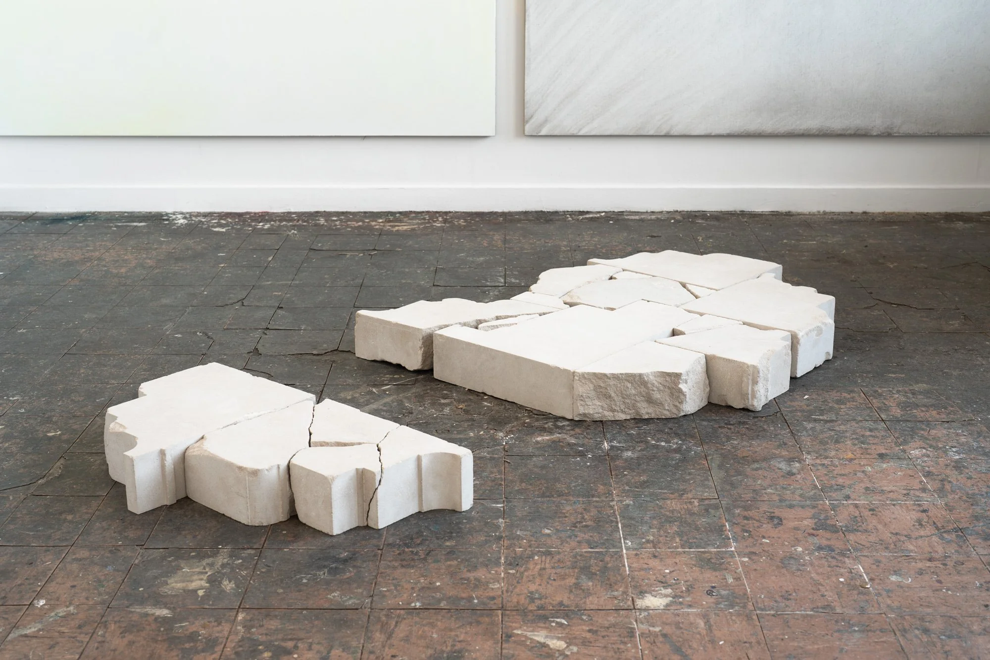 New Order, 2025, Portland stone, size variable, here: 12.5 x 104 x 215 cm