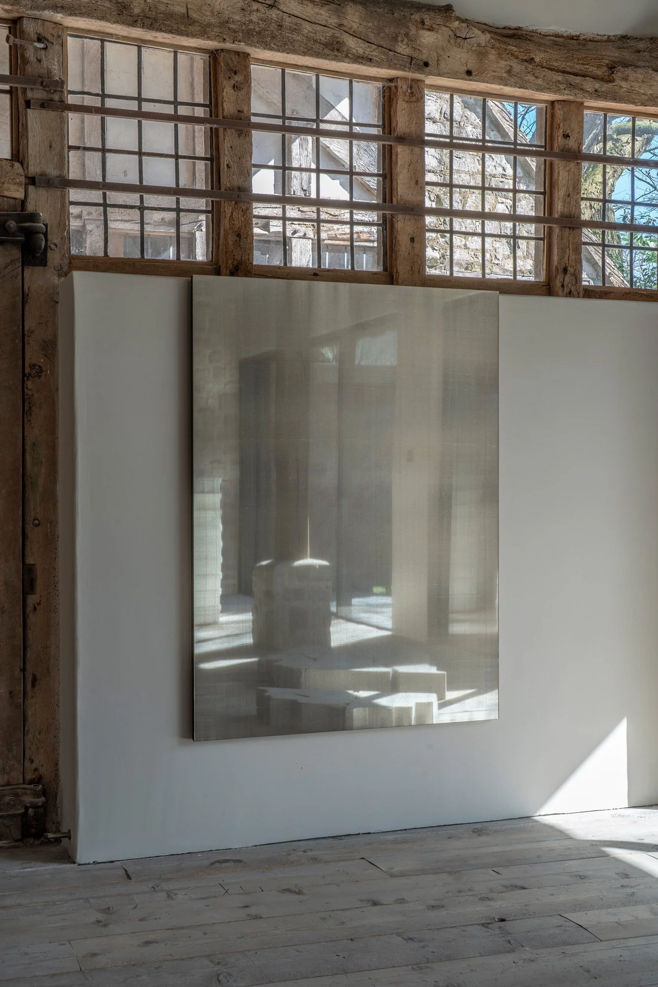 Untitled Silk (in silver) #9, 2025, silk and metal fabric, glass mirror and plywood, 132.5 x 98 x 2.9 cm