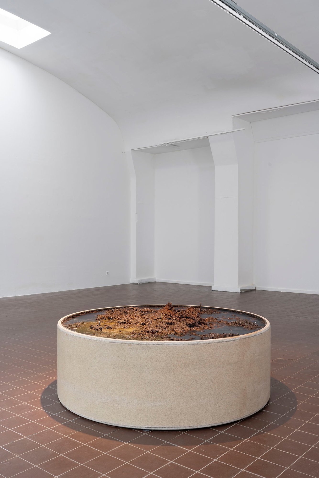 Moorkörper, 2024, glass reinforced plastic pipe, neoprene, black and white peat, water, 50 x 150 x 150 cm