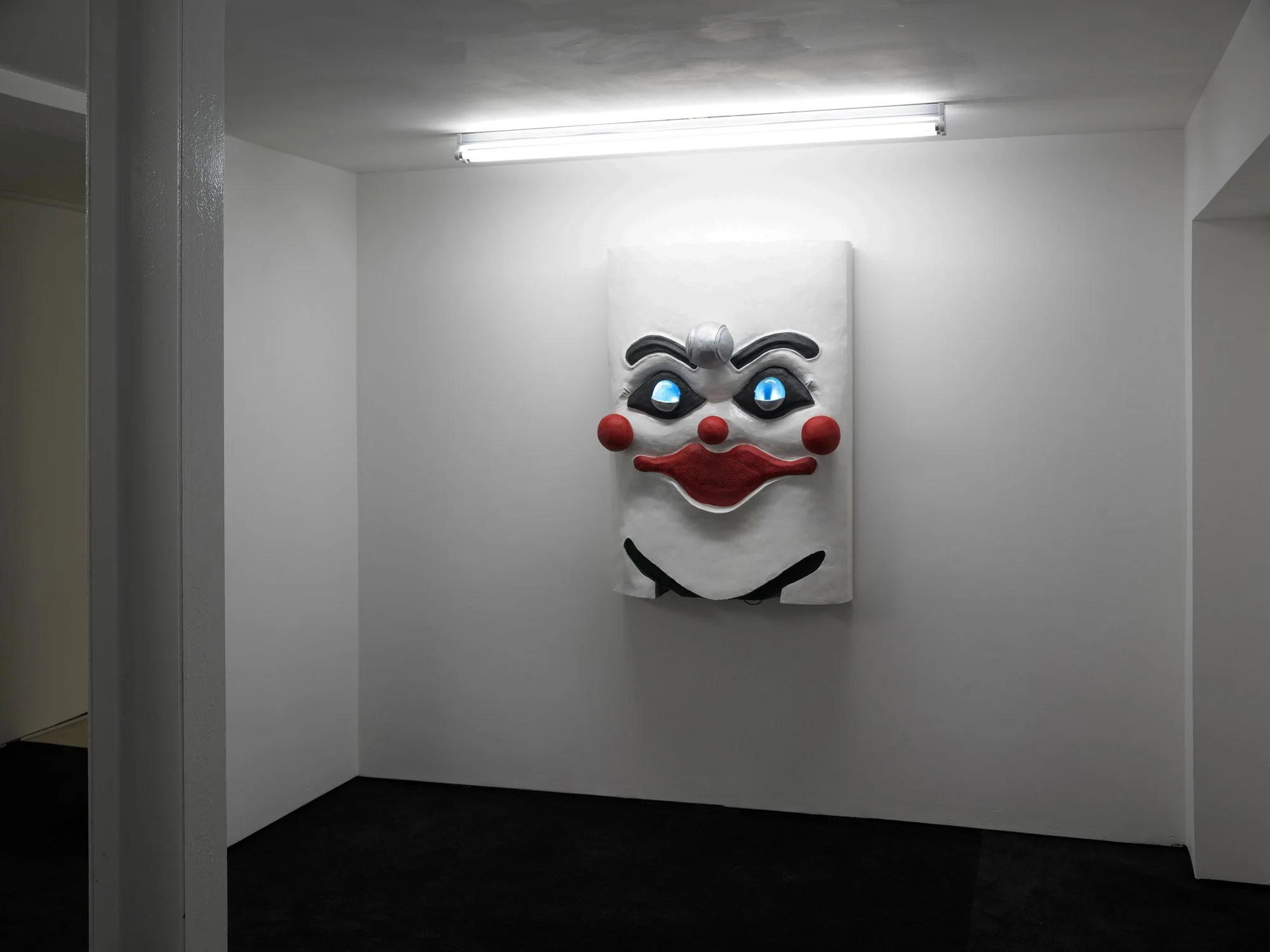 Untitled (clown shaped speaker playing Cook In The Slaughterhouse), 2023, acrylic on mixed media, 125 x 95 x 45 cm