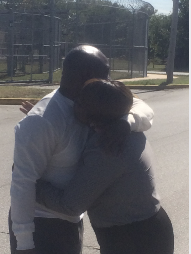 Jermaine “Marlow” Wright hugging his mother after being released from prison, 2015