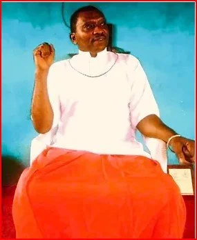 Baba Solomon in traditional Olokun attire (Ika traditional dress).