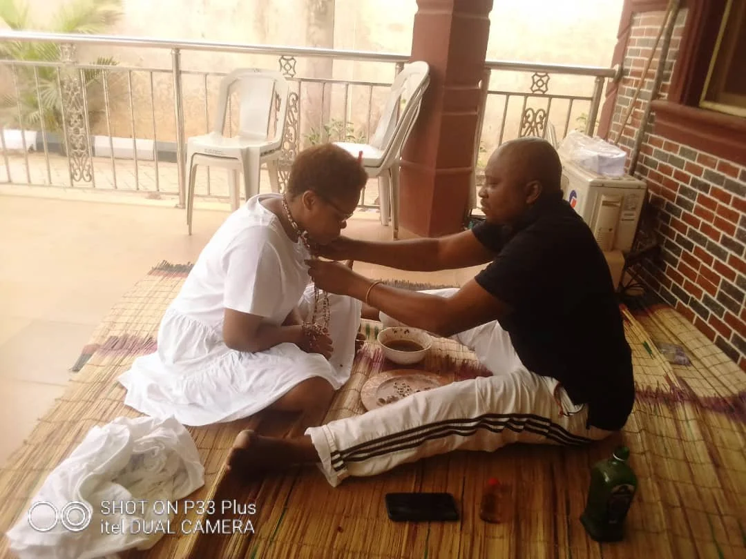 Baba Solomon's new initiate in Ibadan, Nigeria