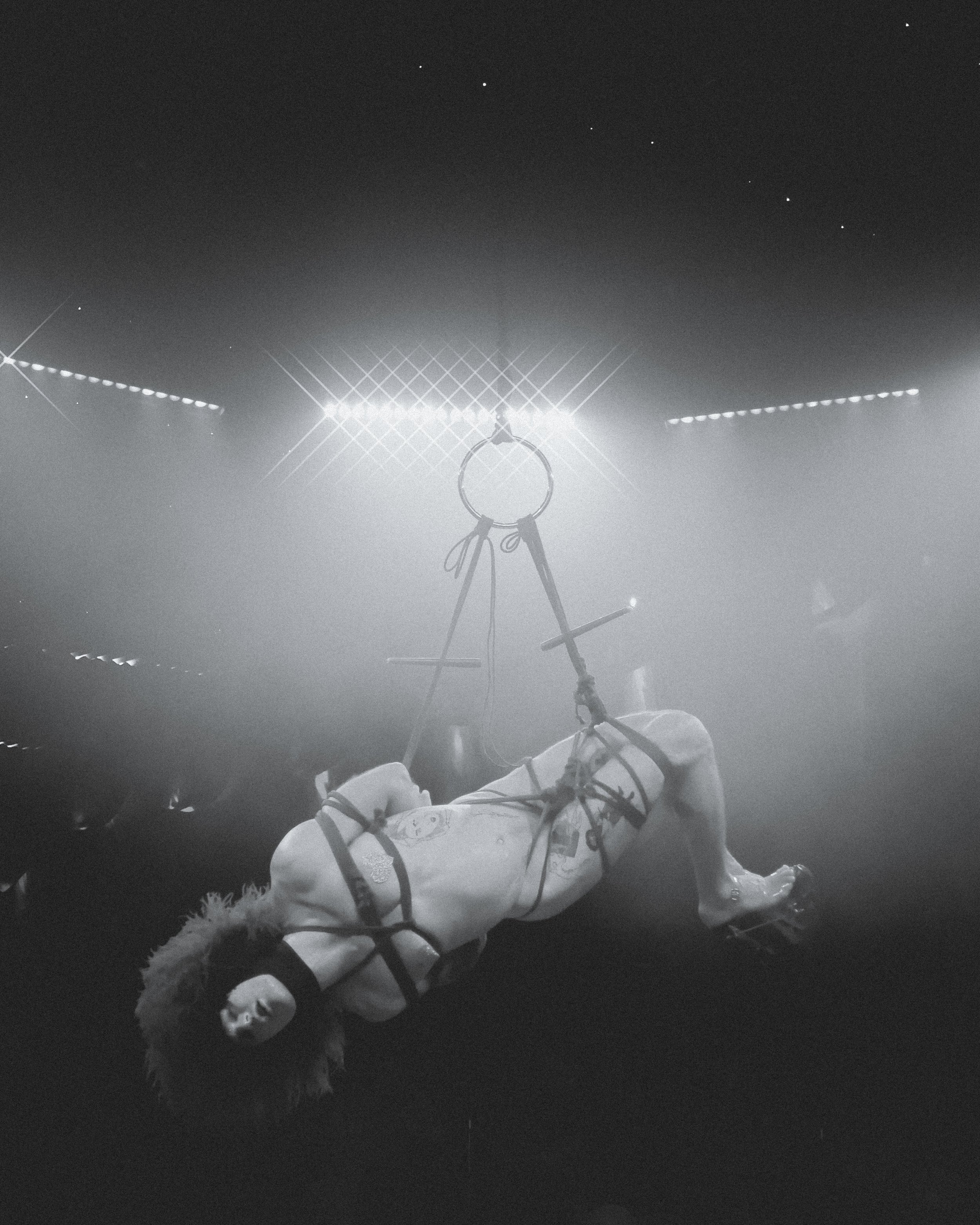 A male submissive tied into a shibari suspension by dominatrix Miss Antartica in the Netherlands