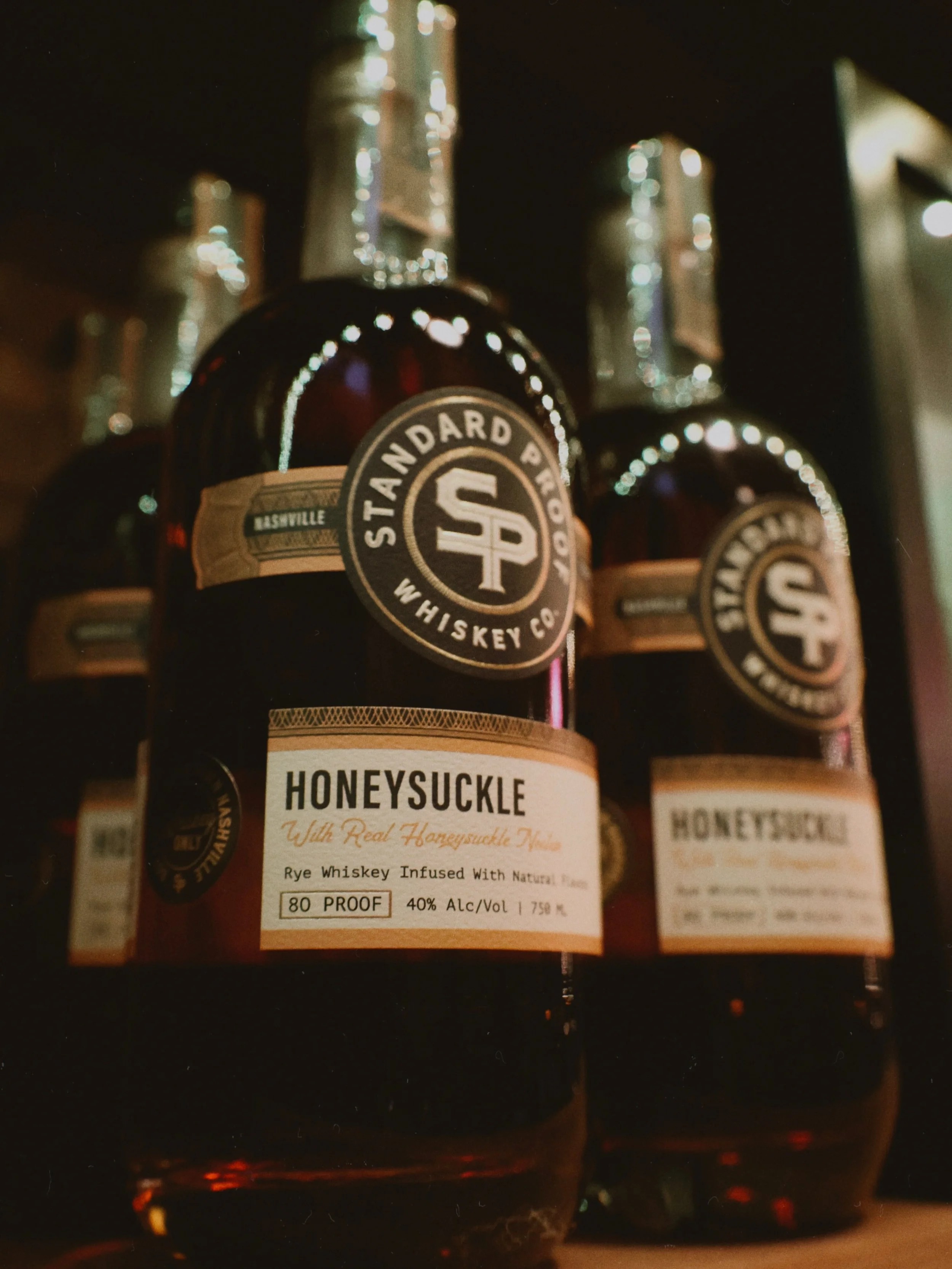 Maybe one of our most unique, and loved bottles. 

Honeysuckle has real honeysuckle nectar up front, rye spice and vanilla underneath, and a finish smooth enough you&rsquo;ll forget it&rsquo;s whiskey. 

Great neat, on the rocks, or in a Honeysuckle 