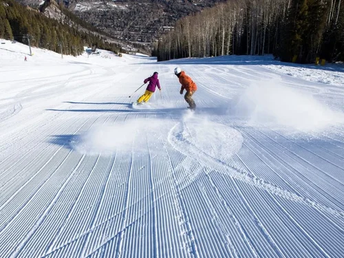 Skier on a groomed run above Aspen, Aspen Intel Winter 2024