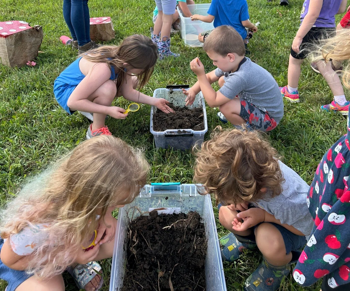 Children at explore bins.jpg