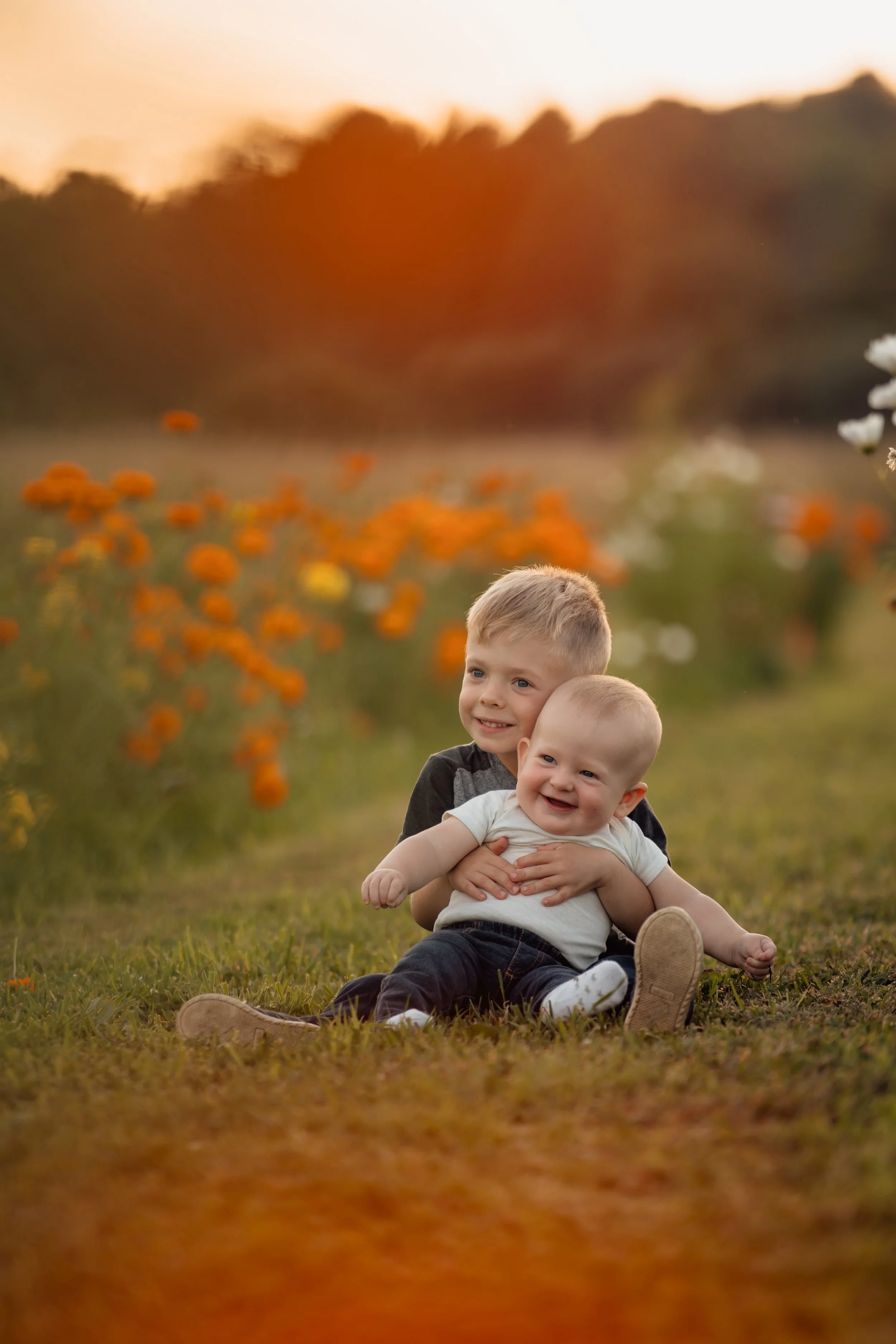 Isaac holding Leo color.jpeg