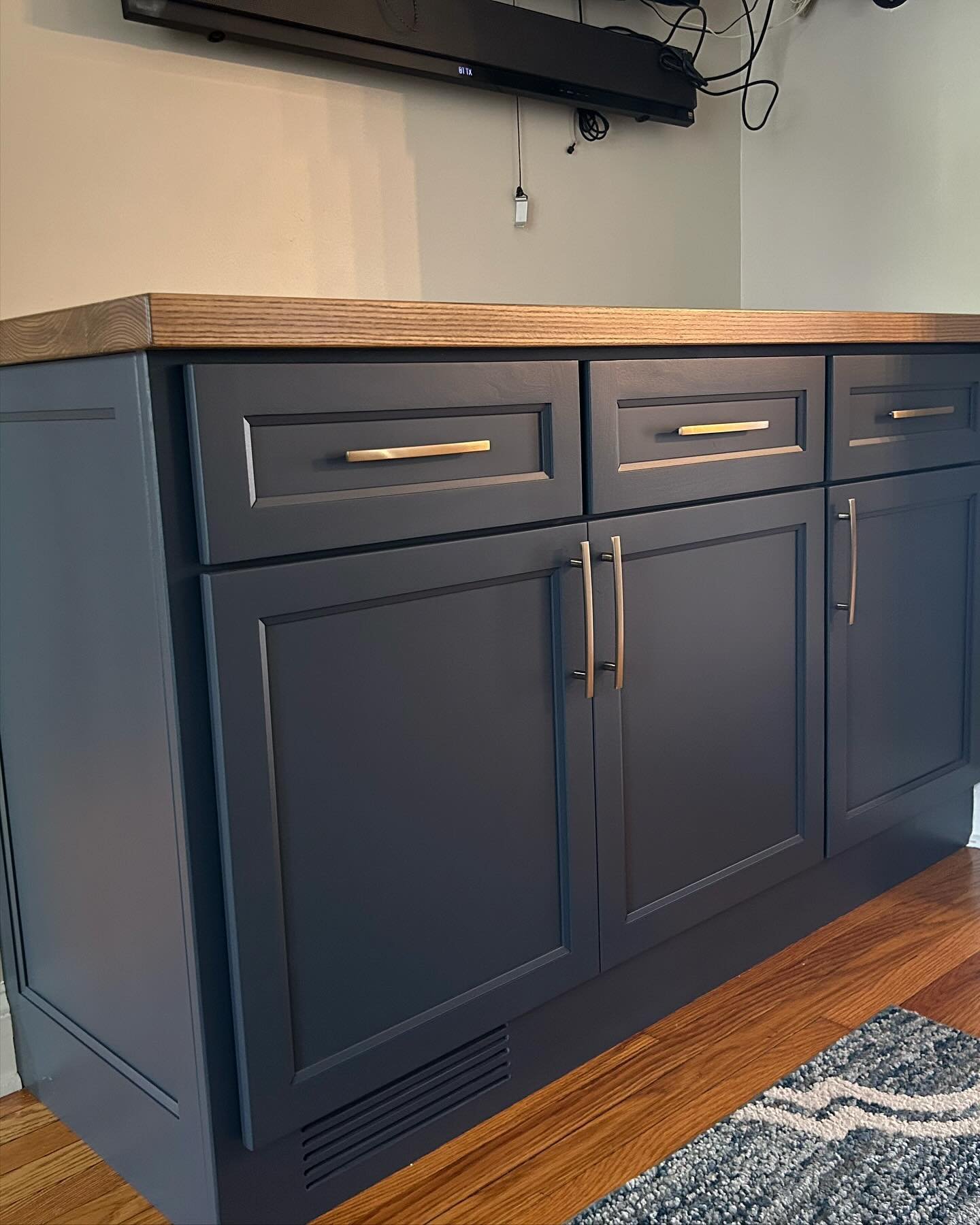 The infamous Corner Crap cabinet as my client called it!! Custom cabinet finished in Hale Navy using Gemini&rsquo;s Evo 20 sheen.  The top is Solid Ash, stained to match a color combo I used on a previous job, and cleared with Old Masters Armor, Sati