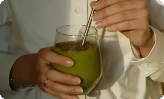 Close of up of man holding a smoothie