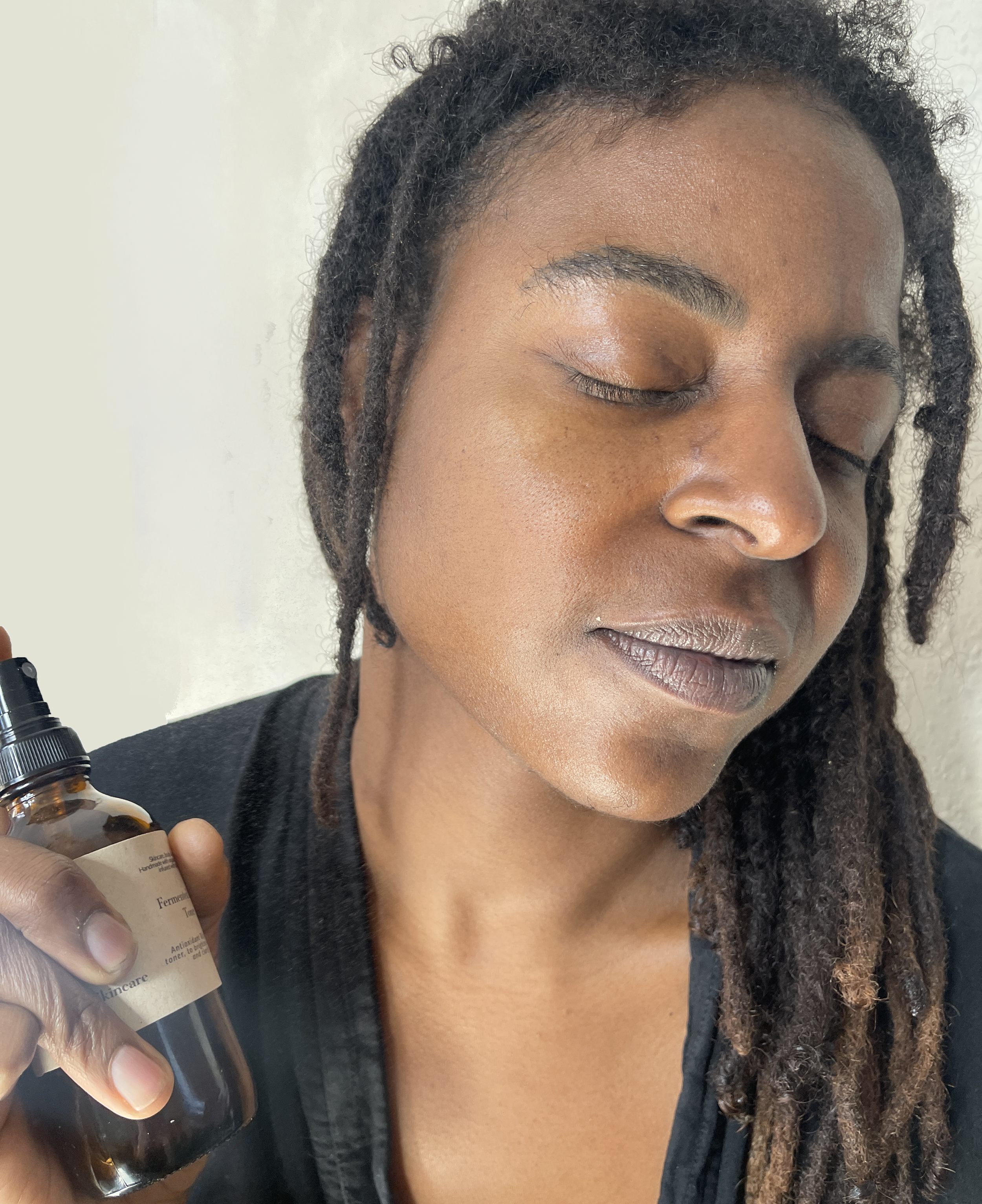 Spraying Fermented Berry Toner .png