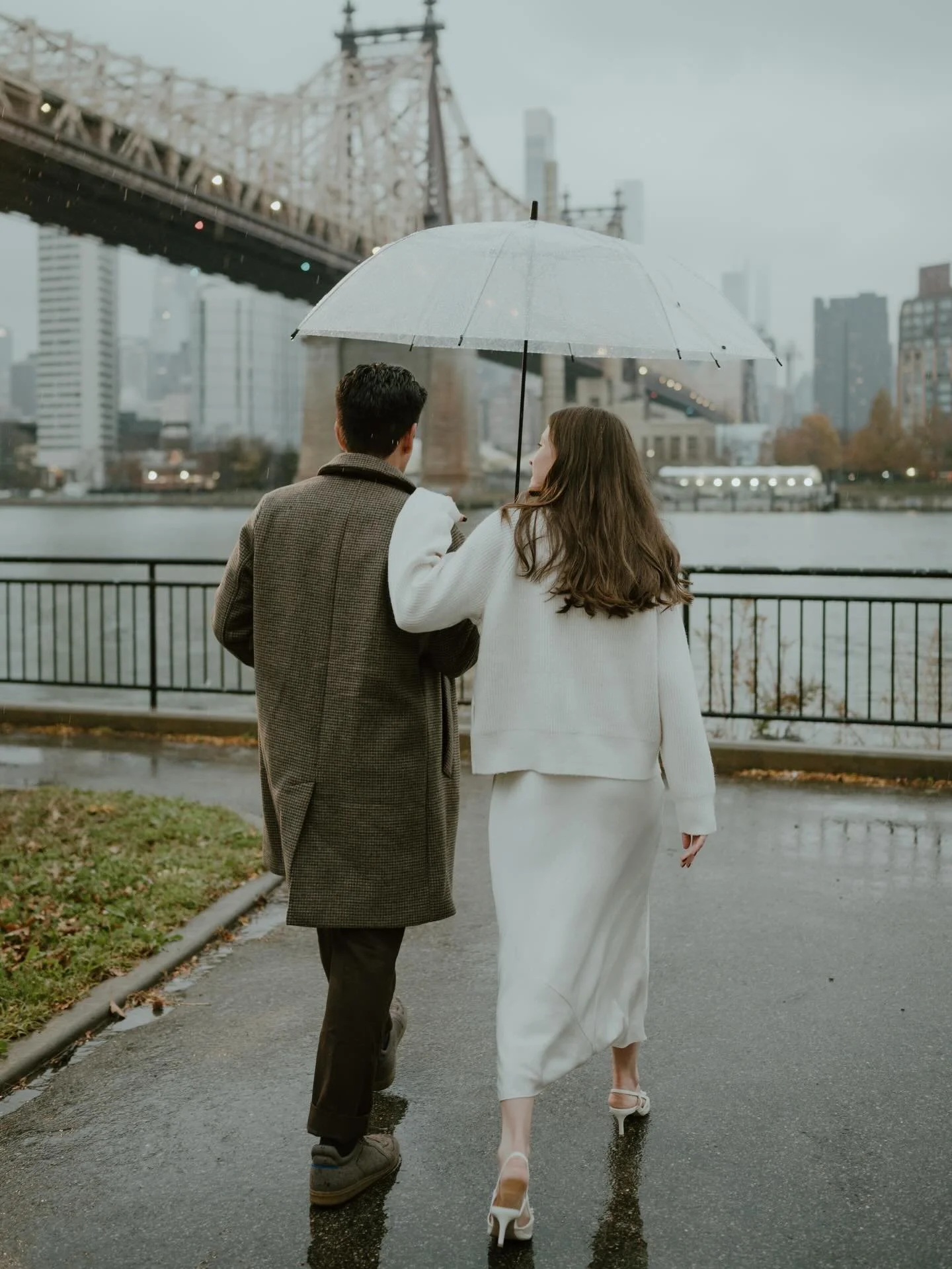 A morning with Emma &amp; Gabe in Long Island City that felt like visual poetry. 

The sky was overcast, the air felt warmer than the day before as the rain fell steadily with a slight chill. The morning fog making the city &amp; Queensboro Bridge fe