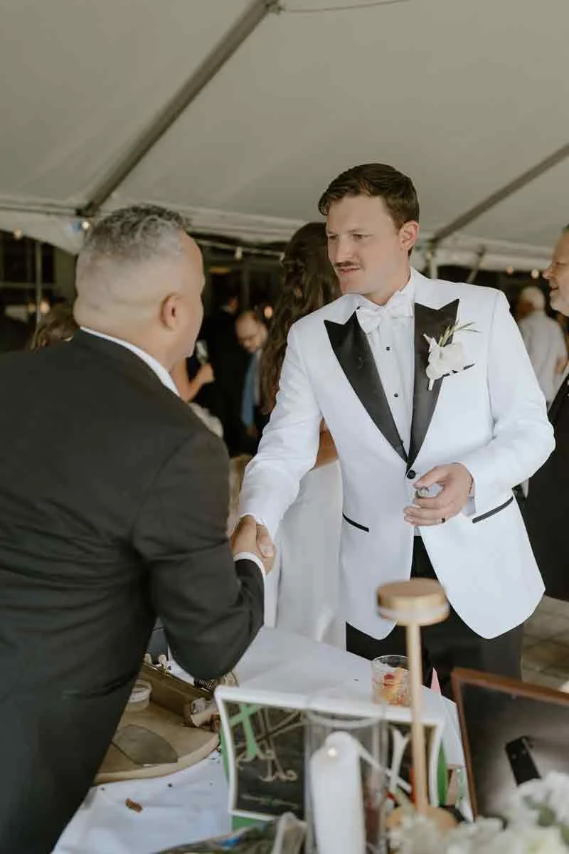 groom enjoying cigar bar at Scranton Country Club