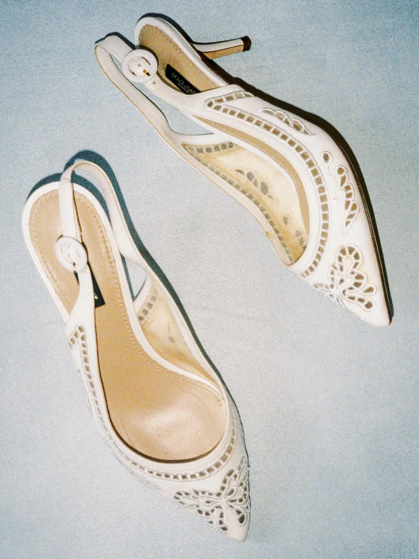 A soft moment for these vintage Dolce &amp; Gabbana kitten heels captured on 35mm film at Hotel Hershey&mdash;some things never go out of style. 

#hotelhershey #dolceandgabbana #vintagebride #lancasterpaweddingphotographer #paweddingphotographer