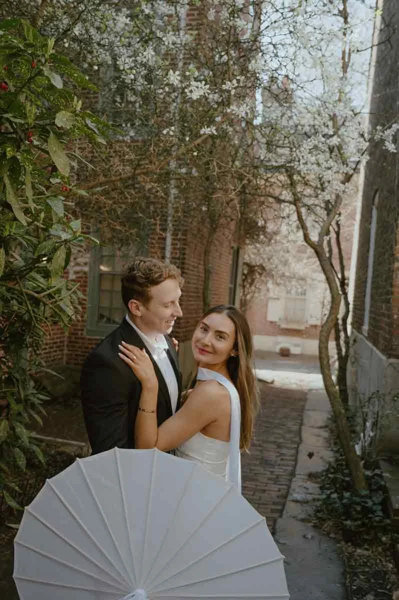 Bride wearing a statement dress with neck veil during Philadelphia engagement session