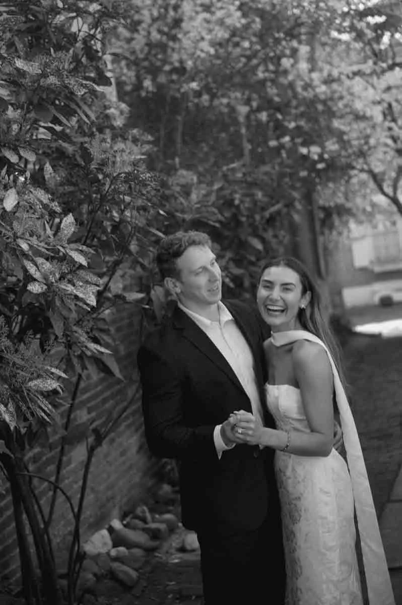 Couple laughing while walking down Elfreth’s Alley in Old City Philadelphia