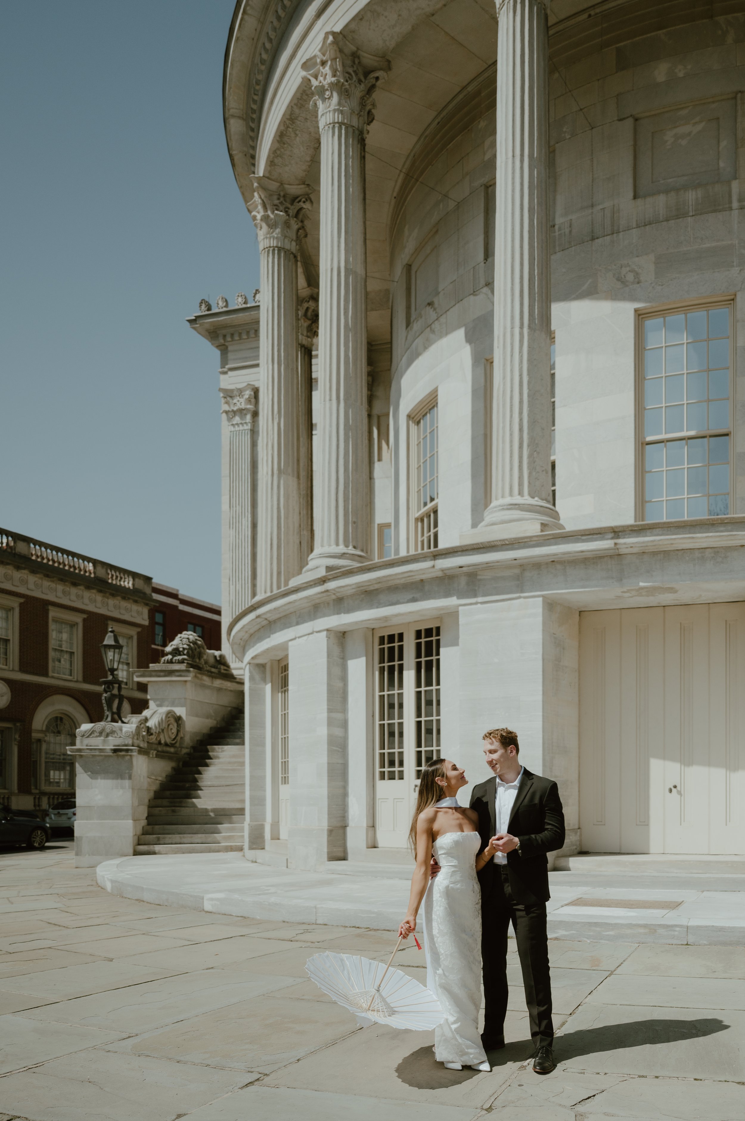 Romantic engagement portrait near the Merchants Exchange Building in Philadelphia