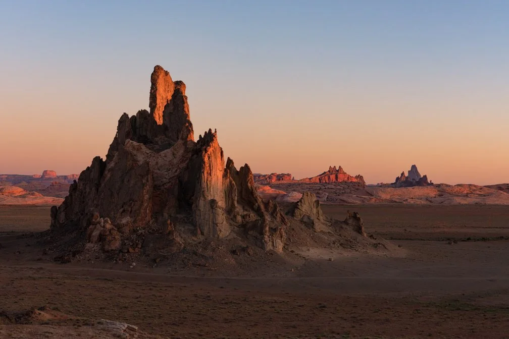 CHURCH ROCK – Early morning rays ignite the spire of Church Rock outside Kayenta, Arizona.