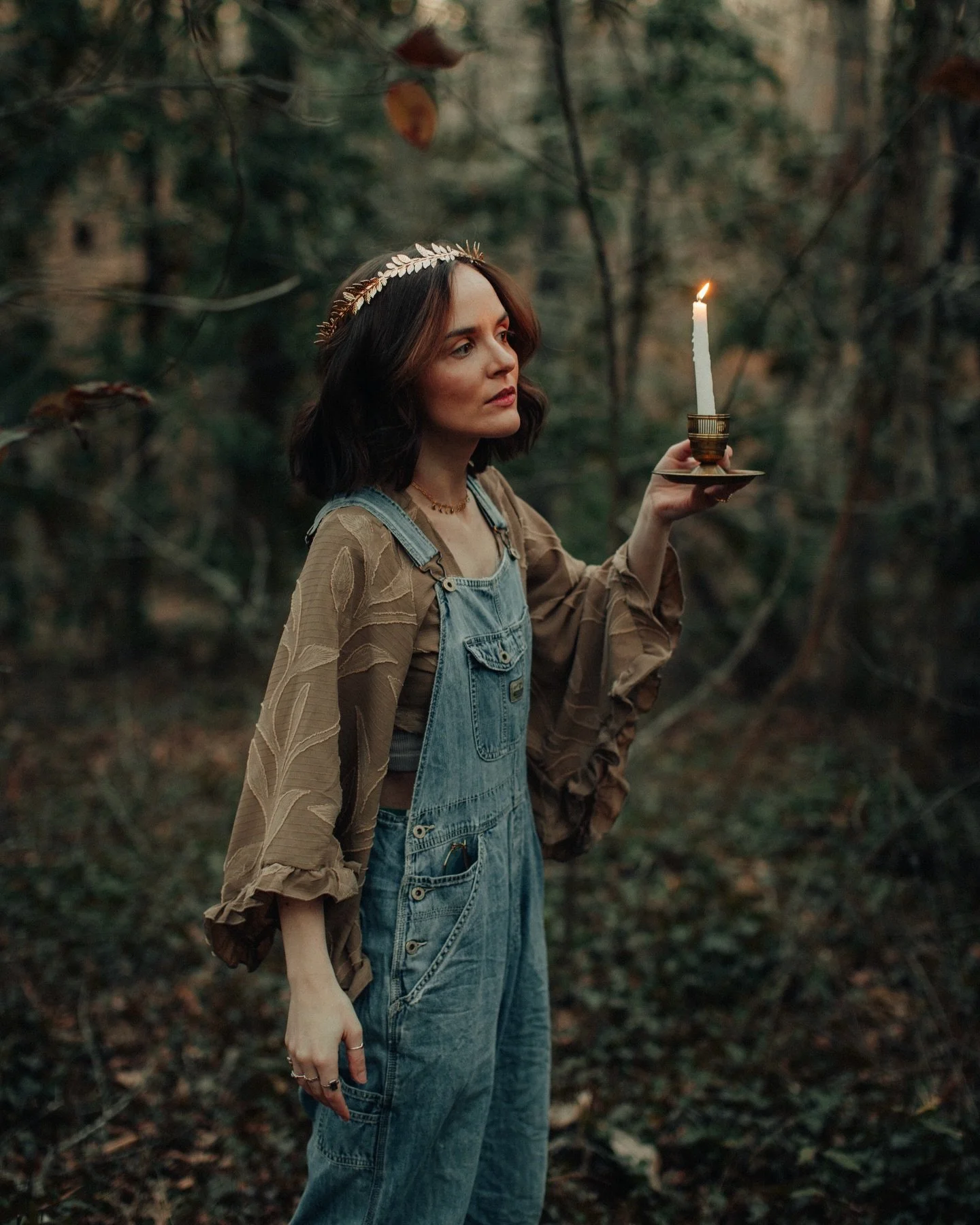 Mirror, book, and candle.

Vanished. Her imagination had only grown stronger in the presence of books.

All it took was a thought&mdash;and once she peered down, she collapsed into her own reflection. 

There in a vignette, she wandered. Her path glo