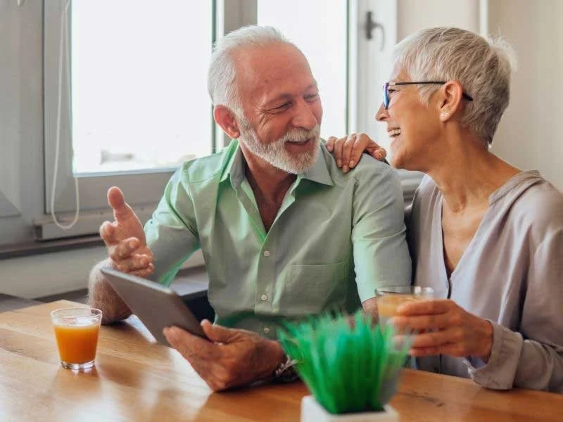 Couple in Redding, CA discussing medicare advantage plans vs medicare supplements plans