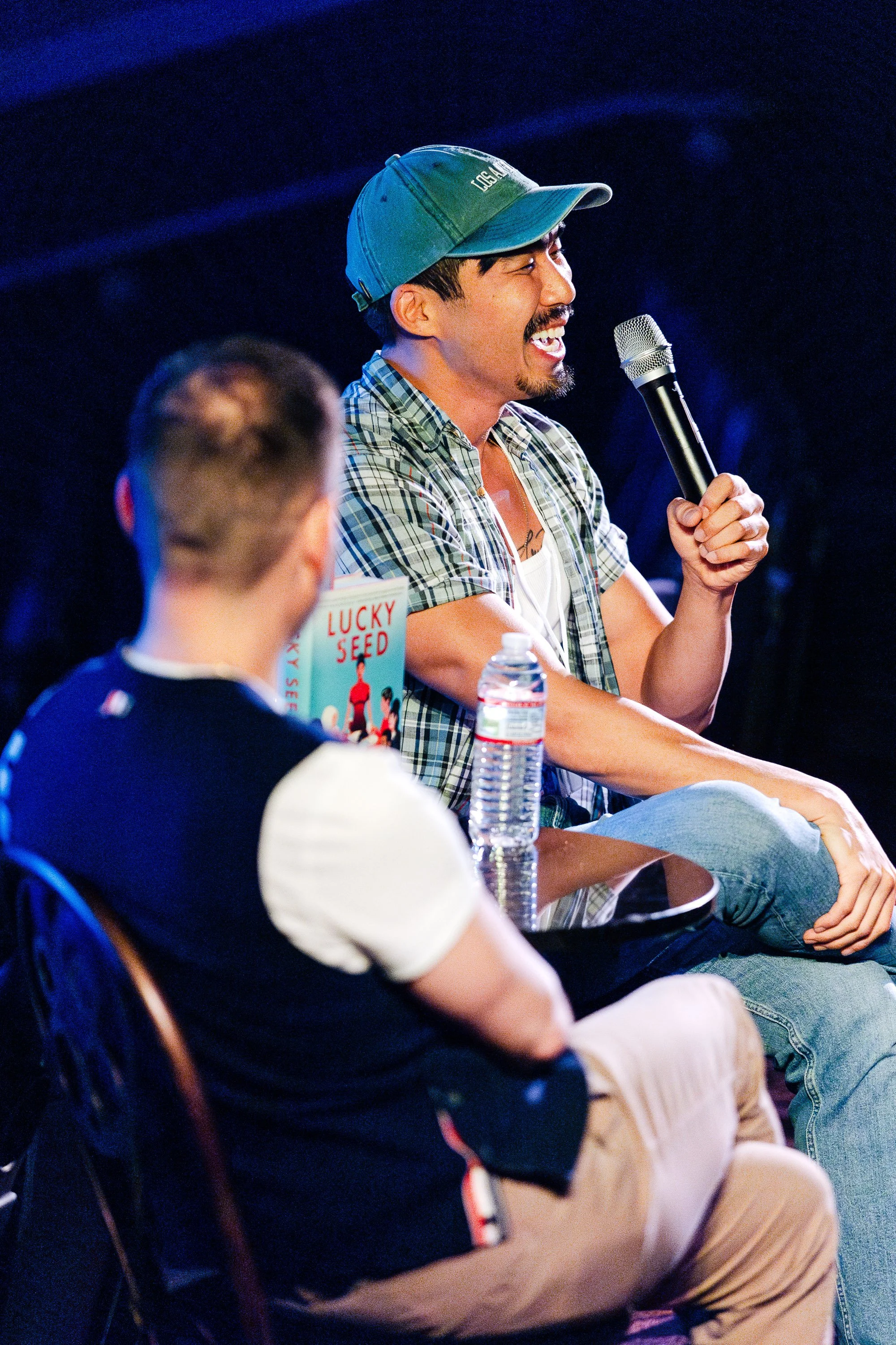 Authors speaking onstage during a literary conversation at Palm Springs Book Fest.