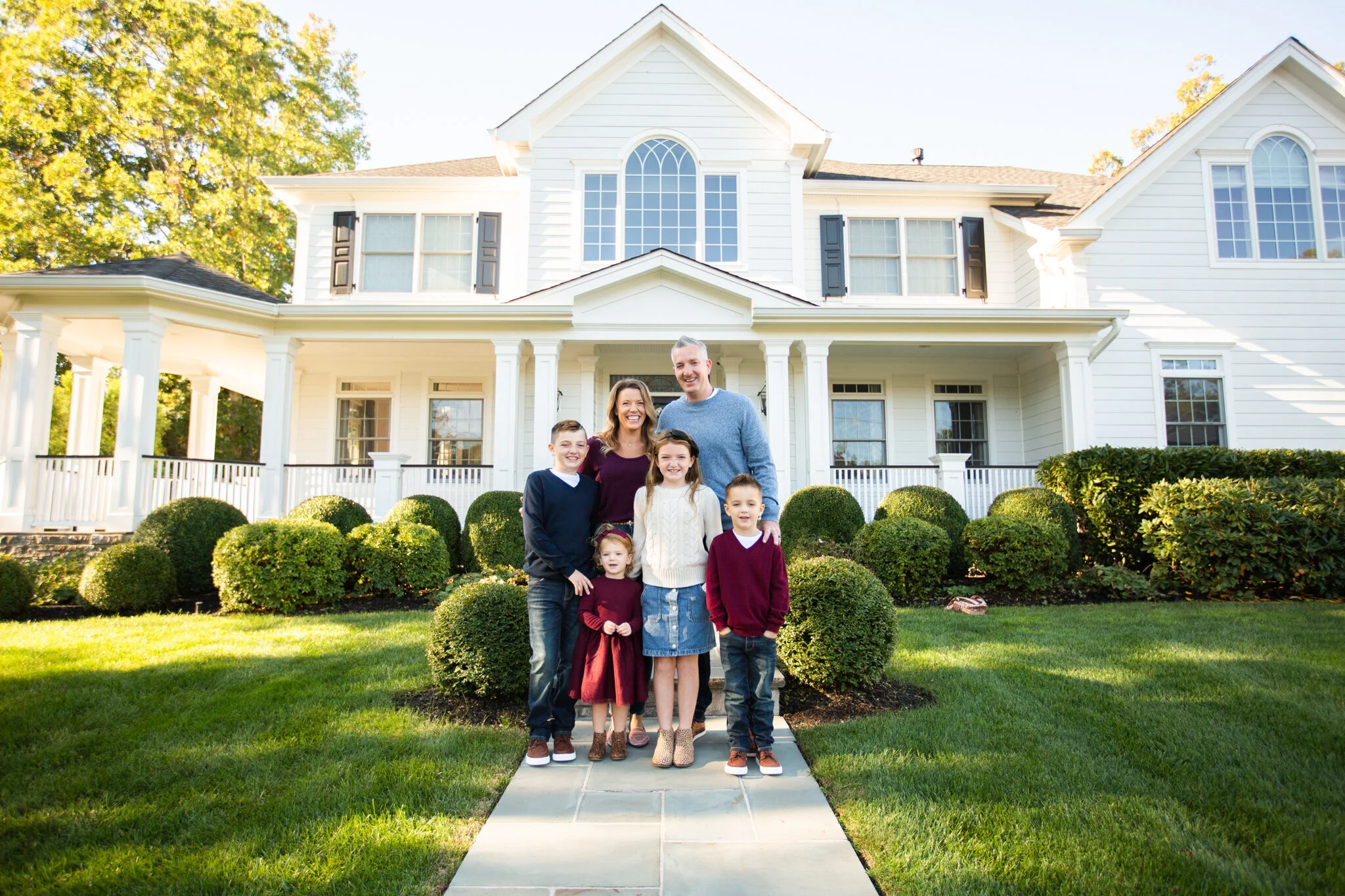Pat McKeon stands in front of his home in this New Jersey brand photography session