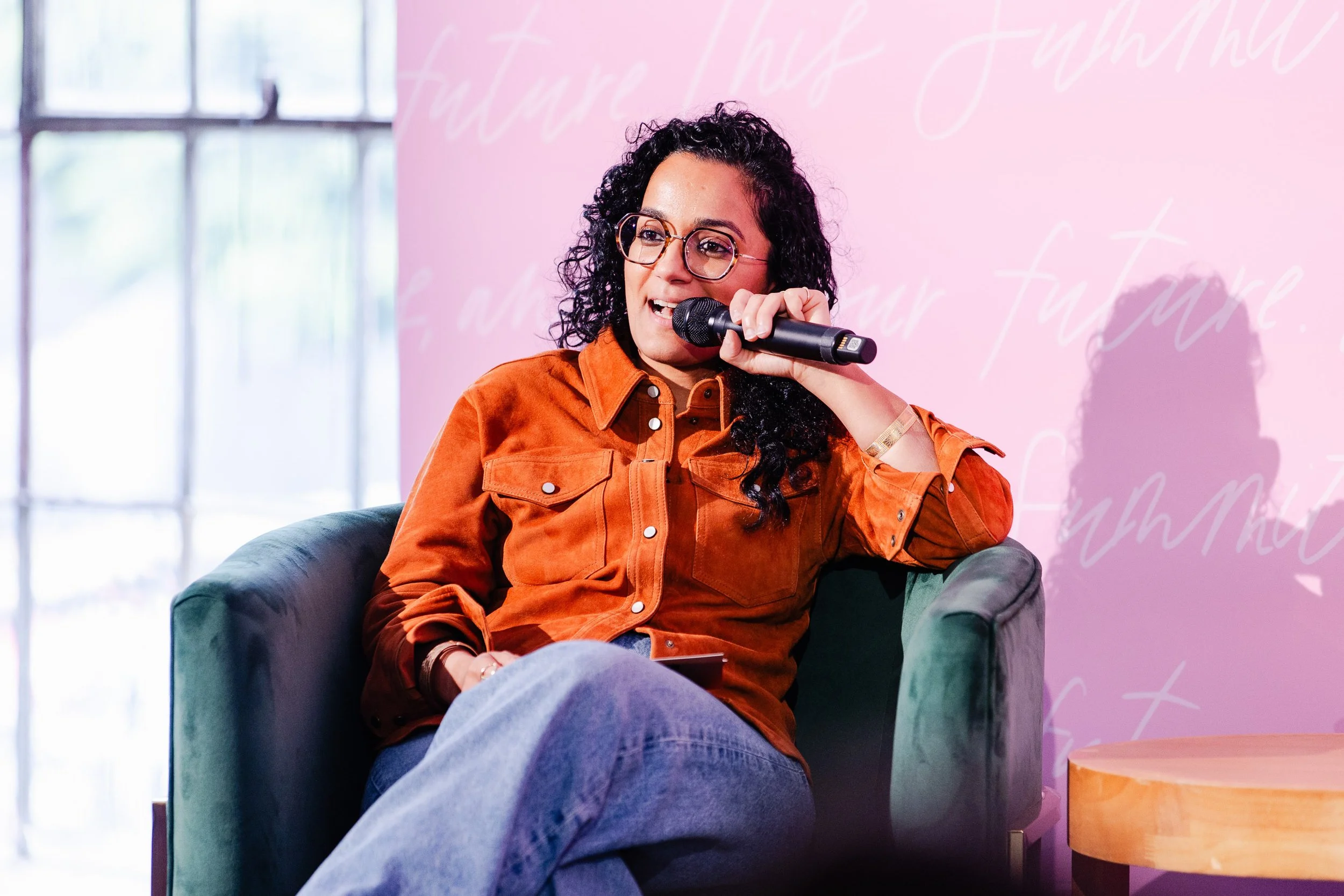 Speaker delivering a talk on stage at a live event, illustrating the importance of a clear message in a professional speaker reel.