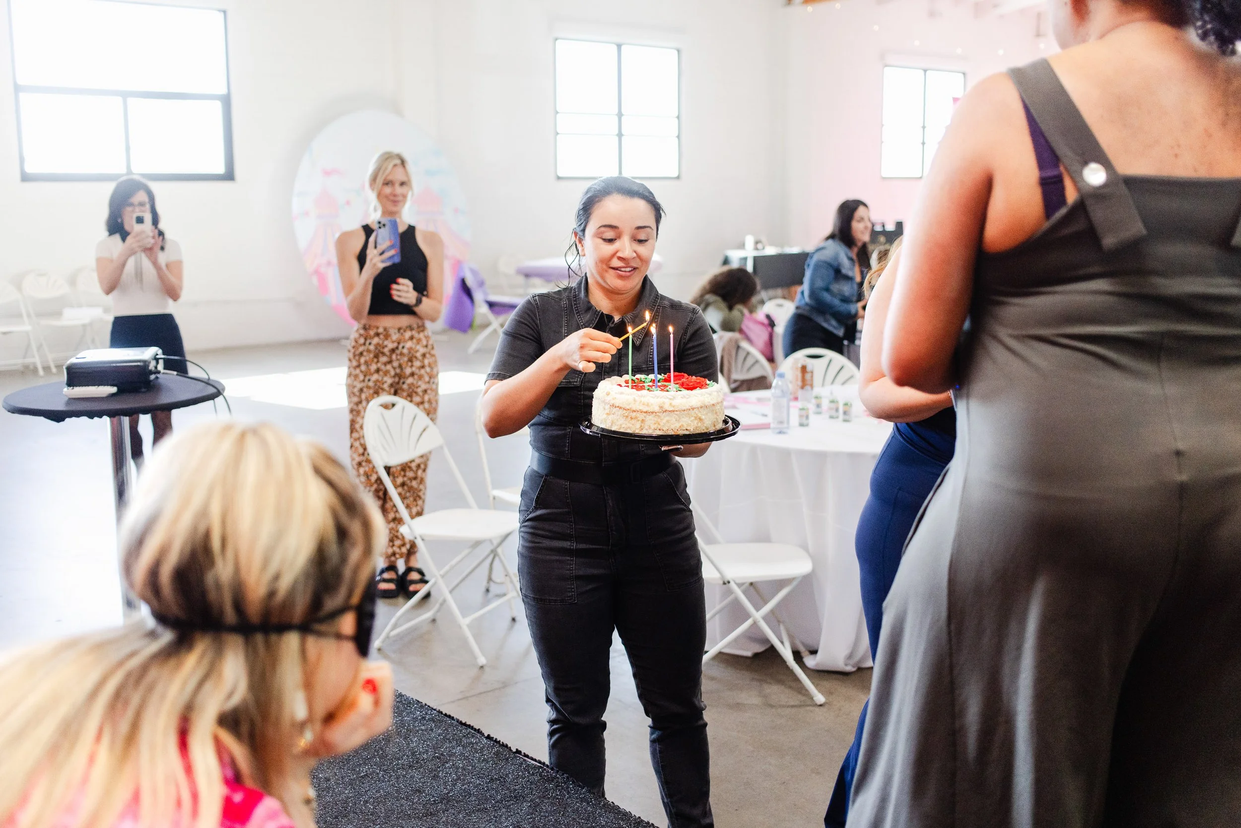 Emotional birthday surprise moment at women’s business retreat