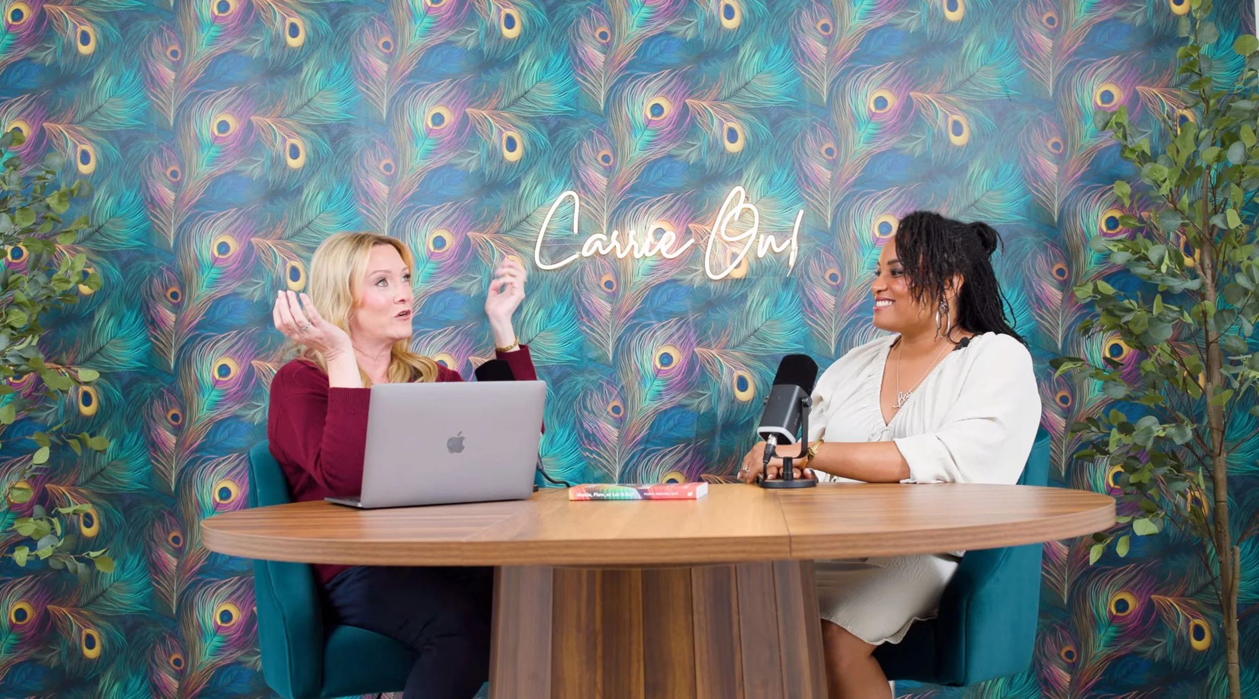 Speaker being interviewed in a professionally recorded video podcast studio, an example of footage that can strengthen a speaker reel.