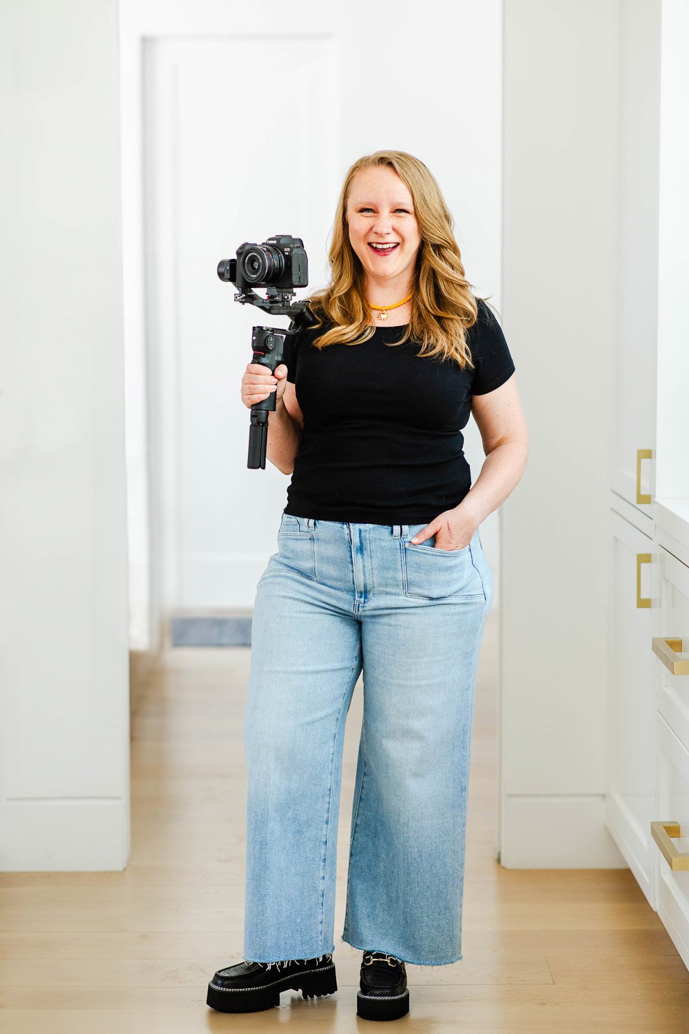 Founder of Solhaus Media with video camera on a gimbal.