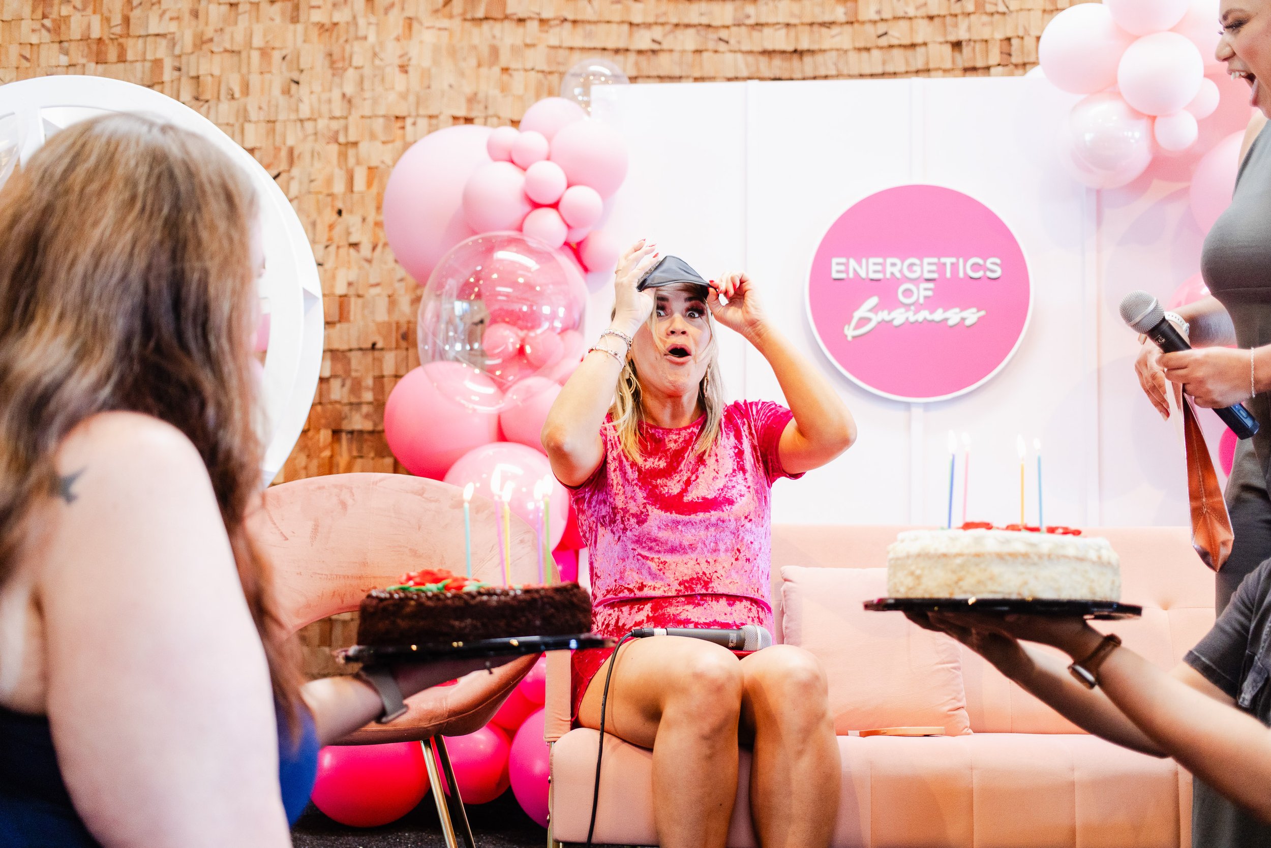 Event organizer surprised with birthday cake on stage