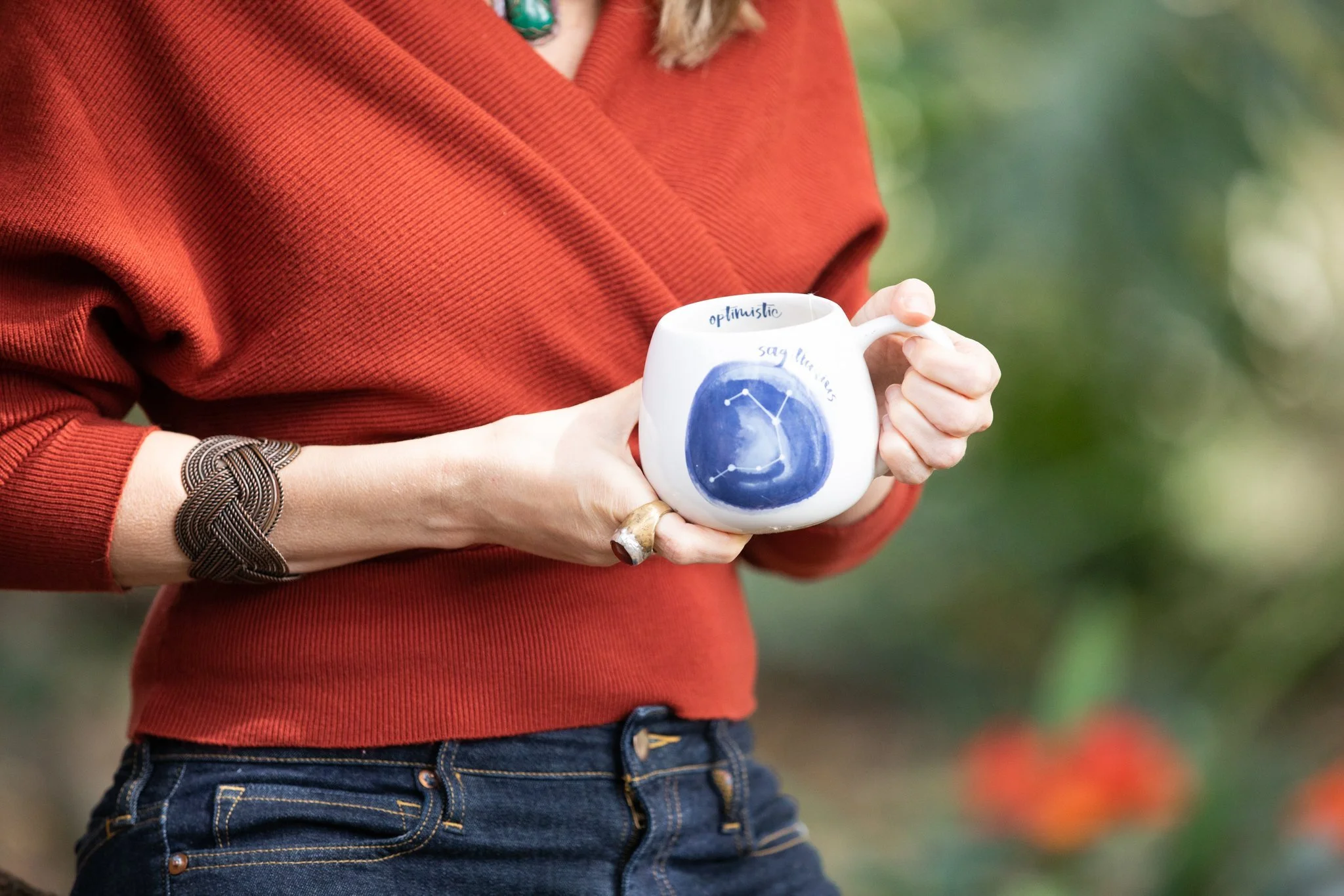 Close-up of a woman holding a mug for a NJ brand photoshoot