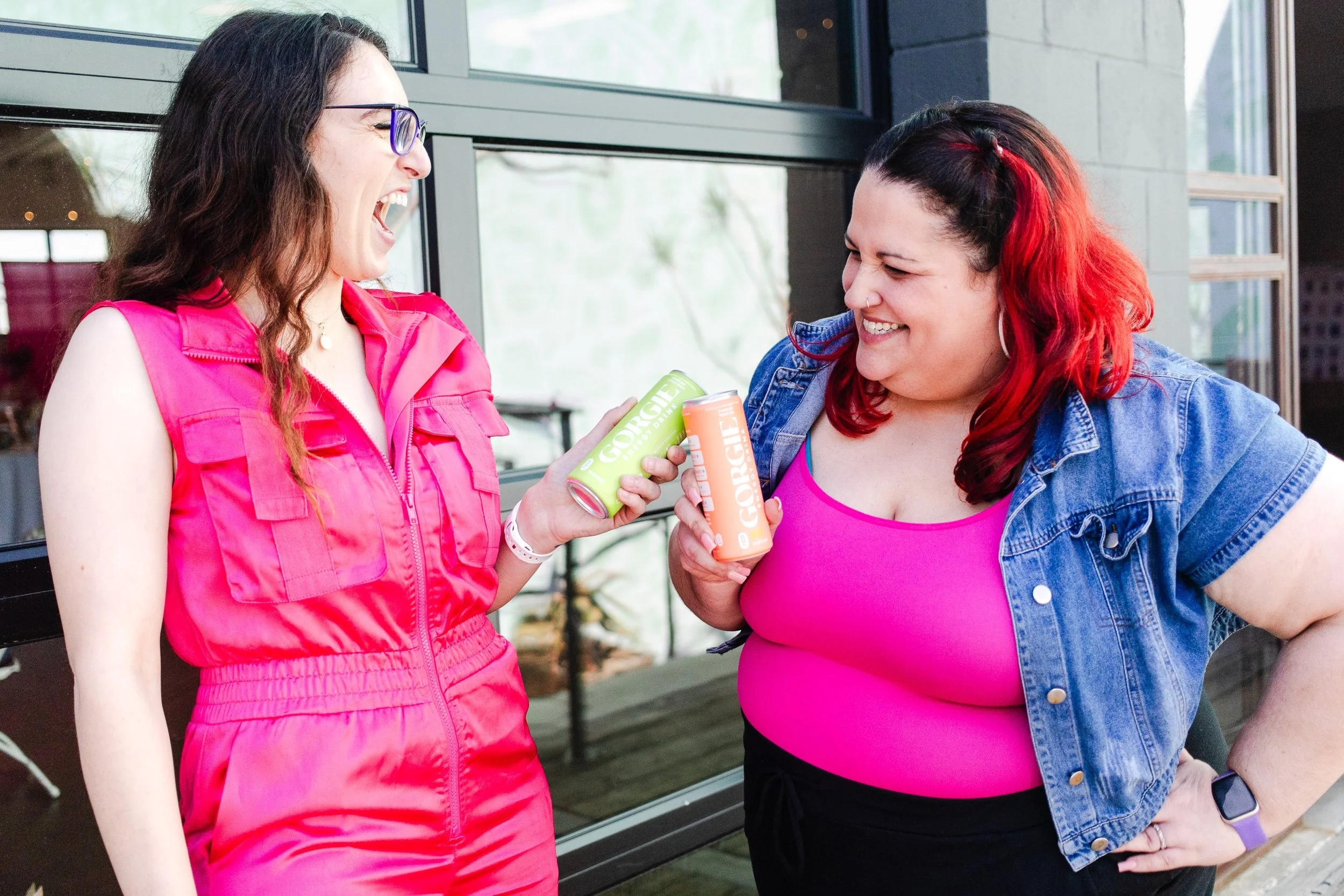 Event attendee holding sponsor beverage during women’s retreat