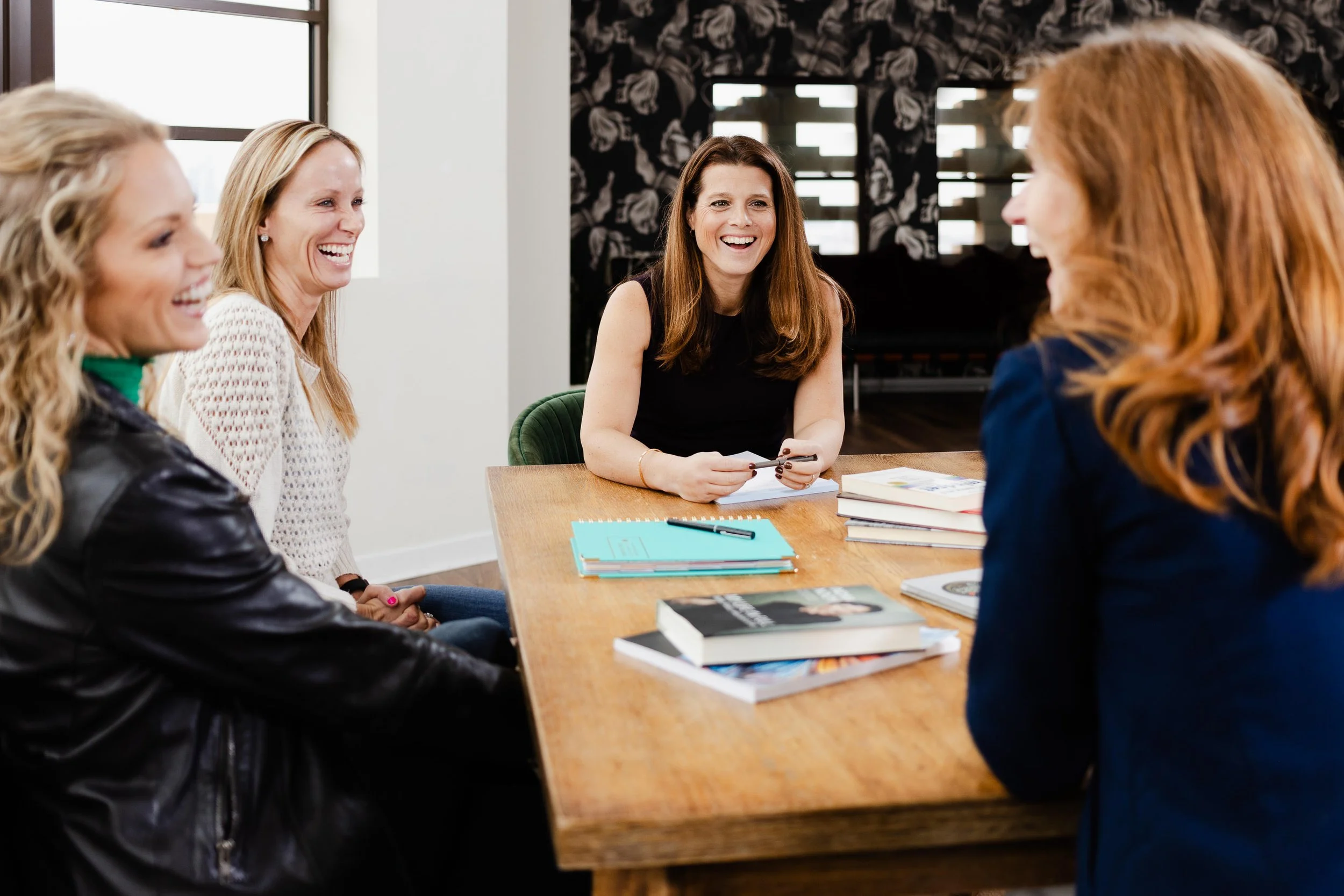 Team members collaborating during a meeting captured for corporate photography in Los Angeles