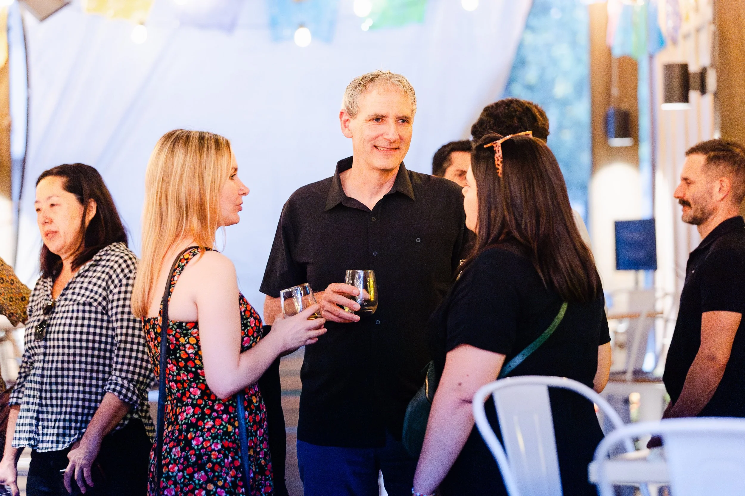 Attendees socializing and networking during Palm Springs Book Fest.