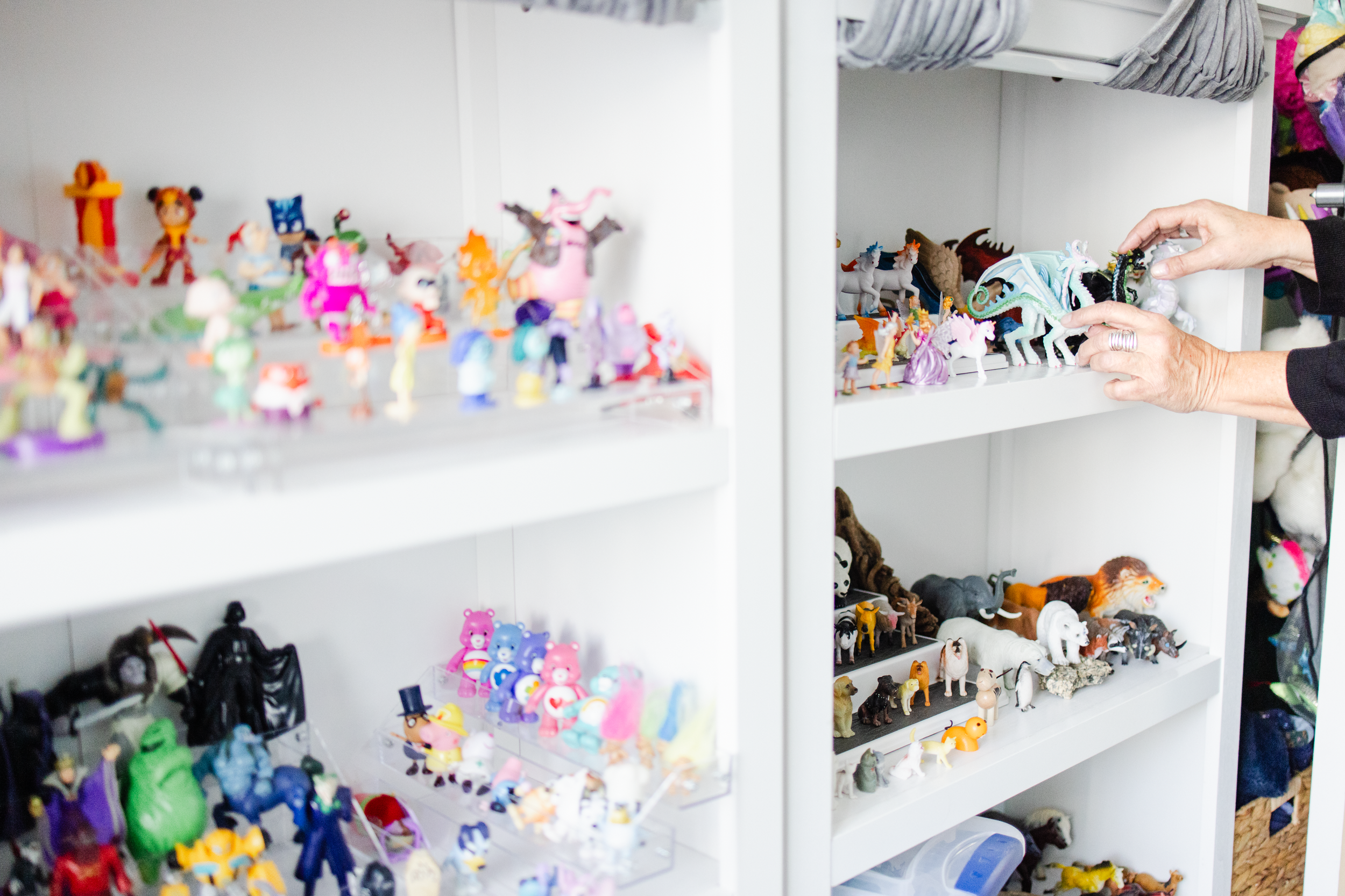 A collection of figurines in a child therapist's office for her branding photo shoot.
