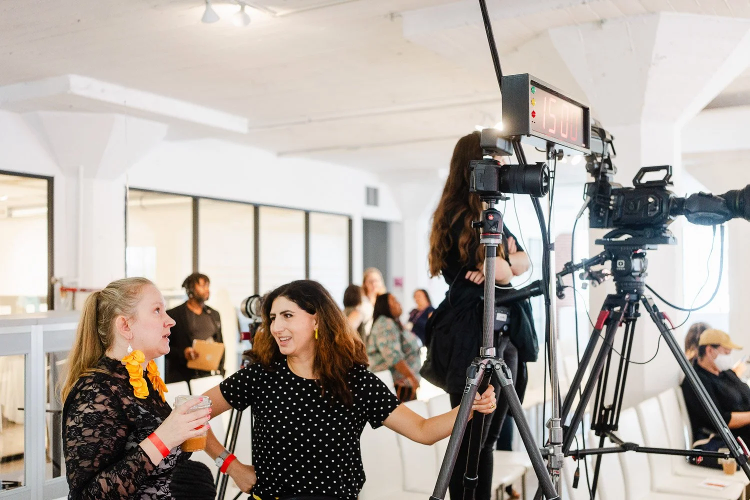 Video agency behind the scenes at nonprofit event.